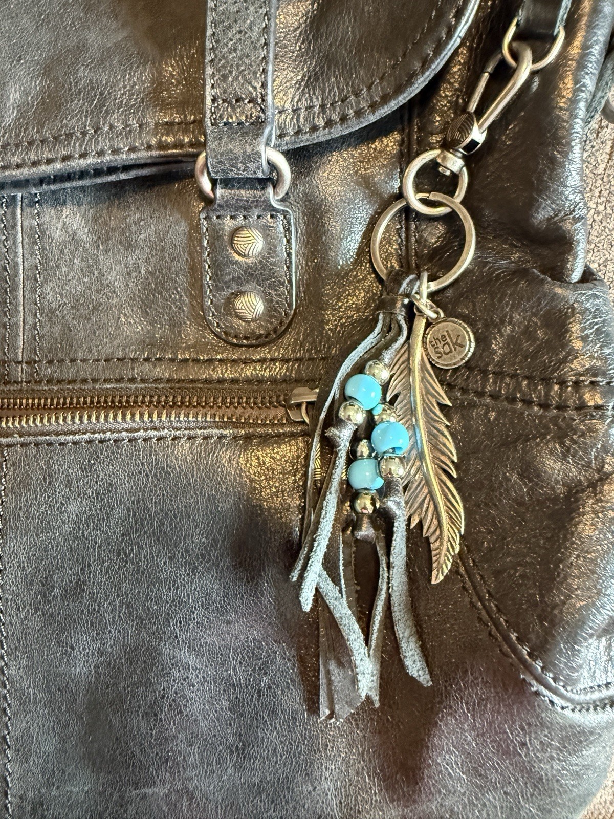 The Sak Black Soft Leather Large Handbag. Front Zipper Pocket. Back Pocket.