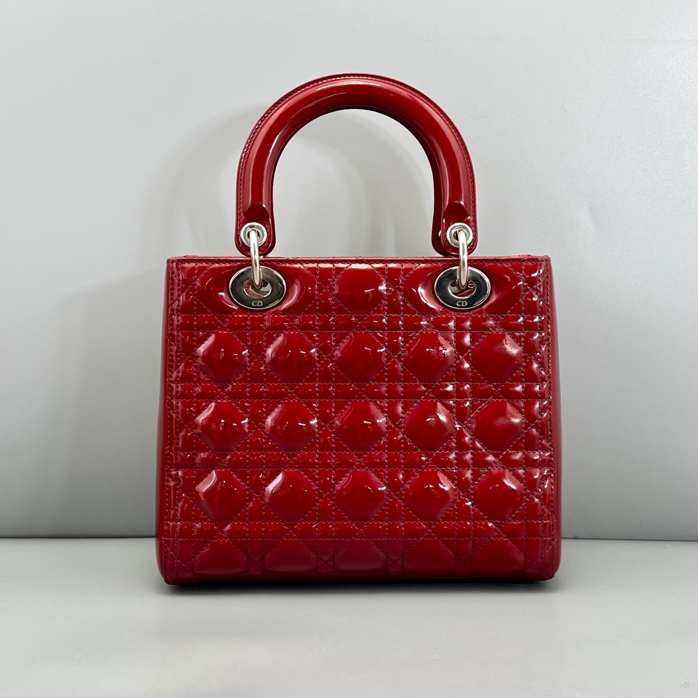 AUTH DIOR Lady Dior Medium Red Patent Leather Top Handle Bag.