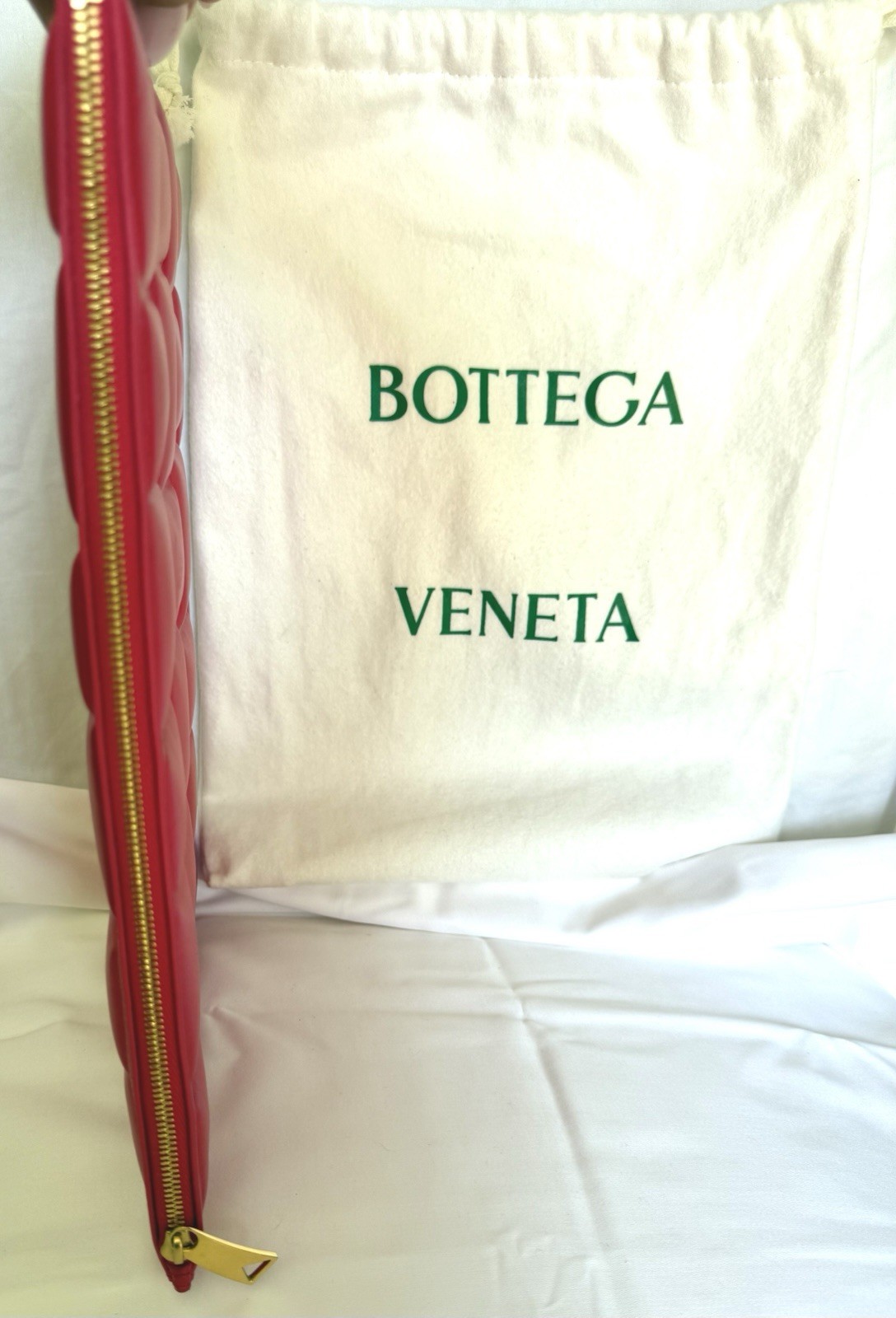 EUC 🩷 Bottega Veneta Puffy Zip Clutch in Color Firework. $1850 retail