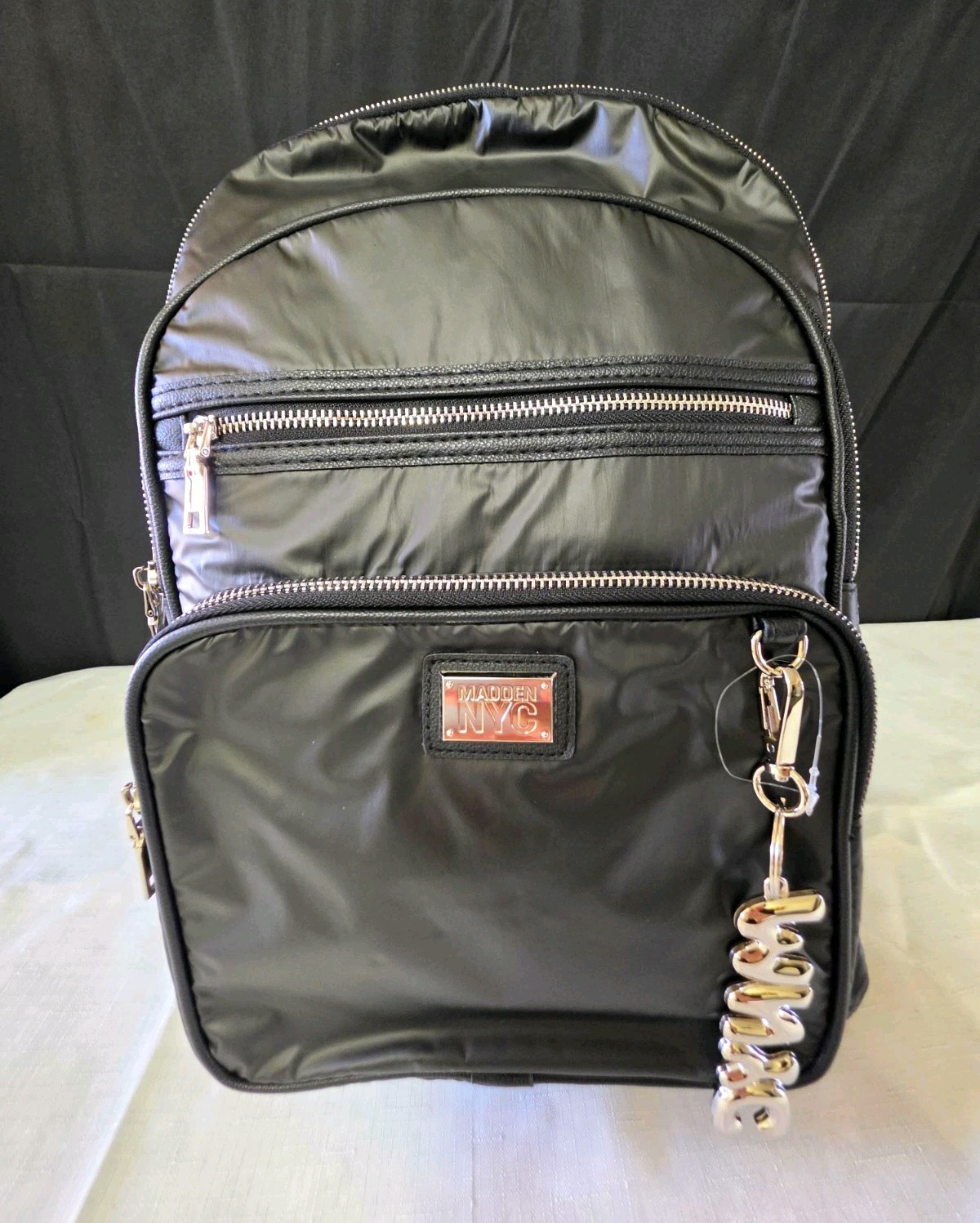 Madden NYC Black Medium Backpack Multi-Zip Padded Pockets Silver Charm