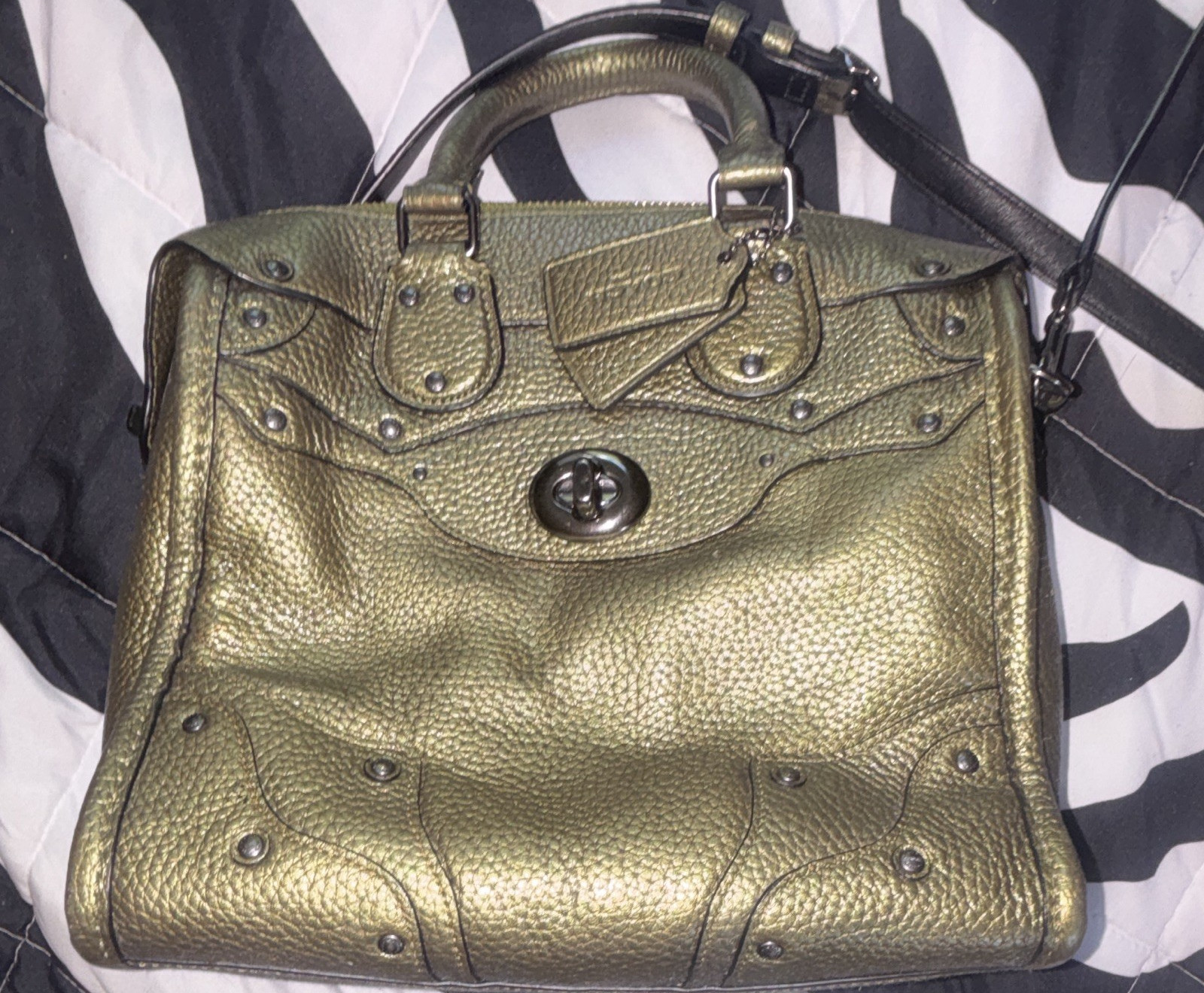 Coach Rhyder 33 satchel in metallic pebble leather