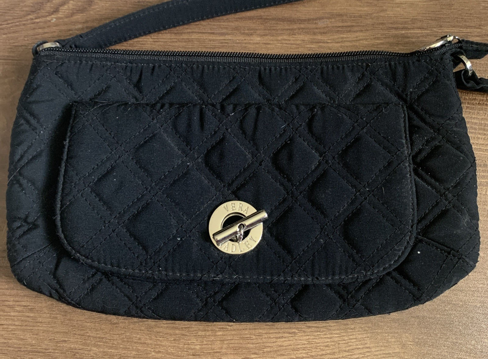 Vera Bradley small black bag-silver hardware-approx 10.5 x 6 in-phone pocket