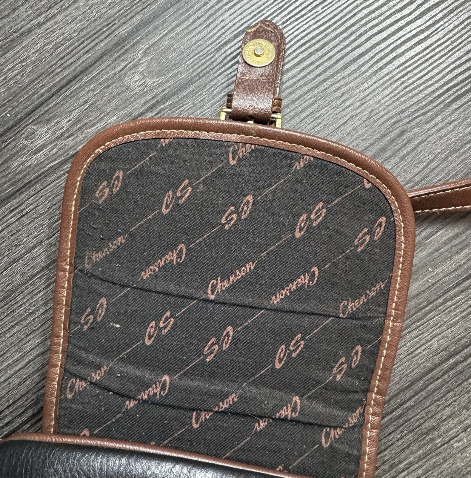 Leather Crossbody Bag Chenson Dark Black with Brown Trim .