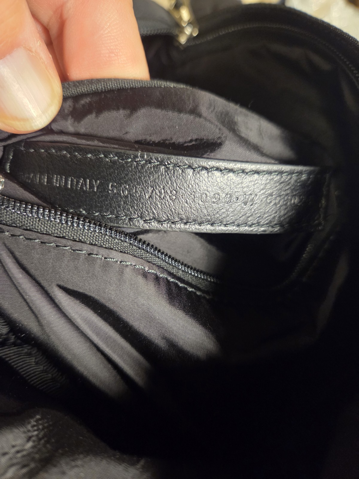 This All Black Nylon Balenciaga mini back pack is the it bag this season!
