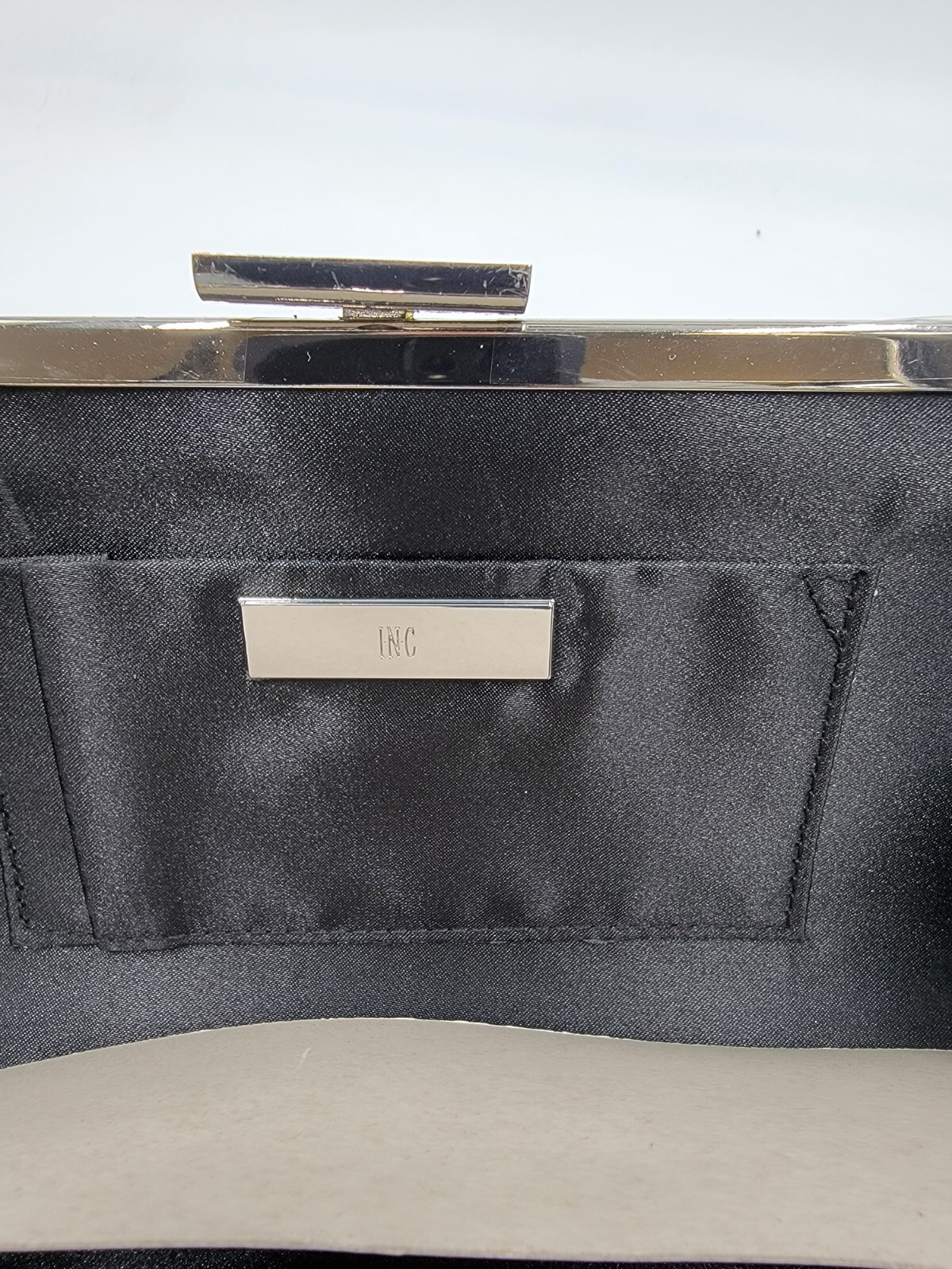 I.N.C. International Concepts Kelsie Clutch Women Black/Silver Tab-Frame Closure