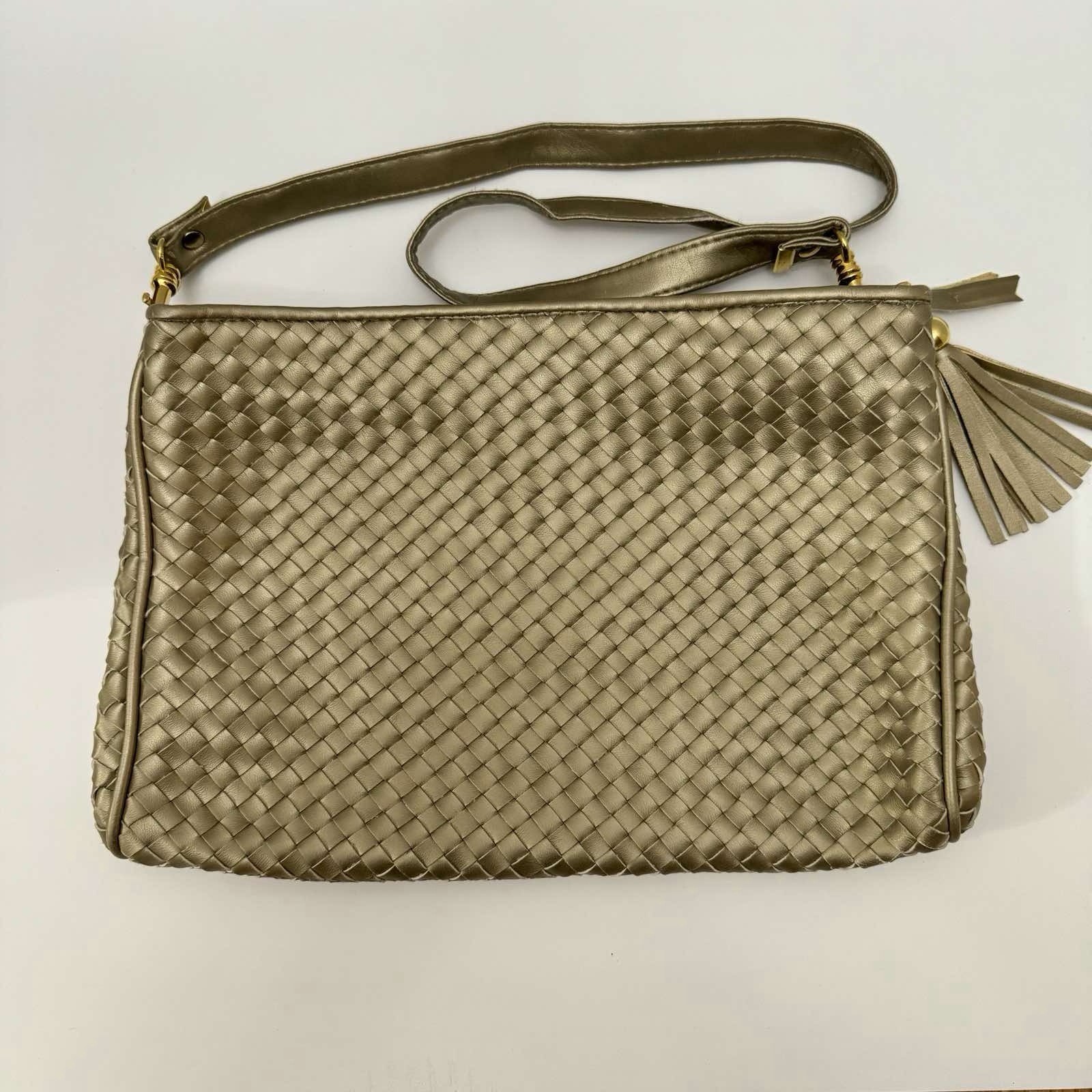 Warren Reed Gold Woven Shoulder Bag with Tassel, Zip Closure, Inner Pockets