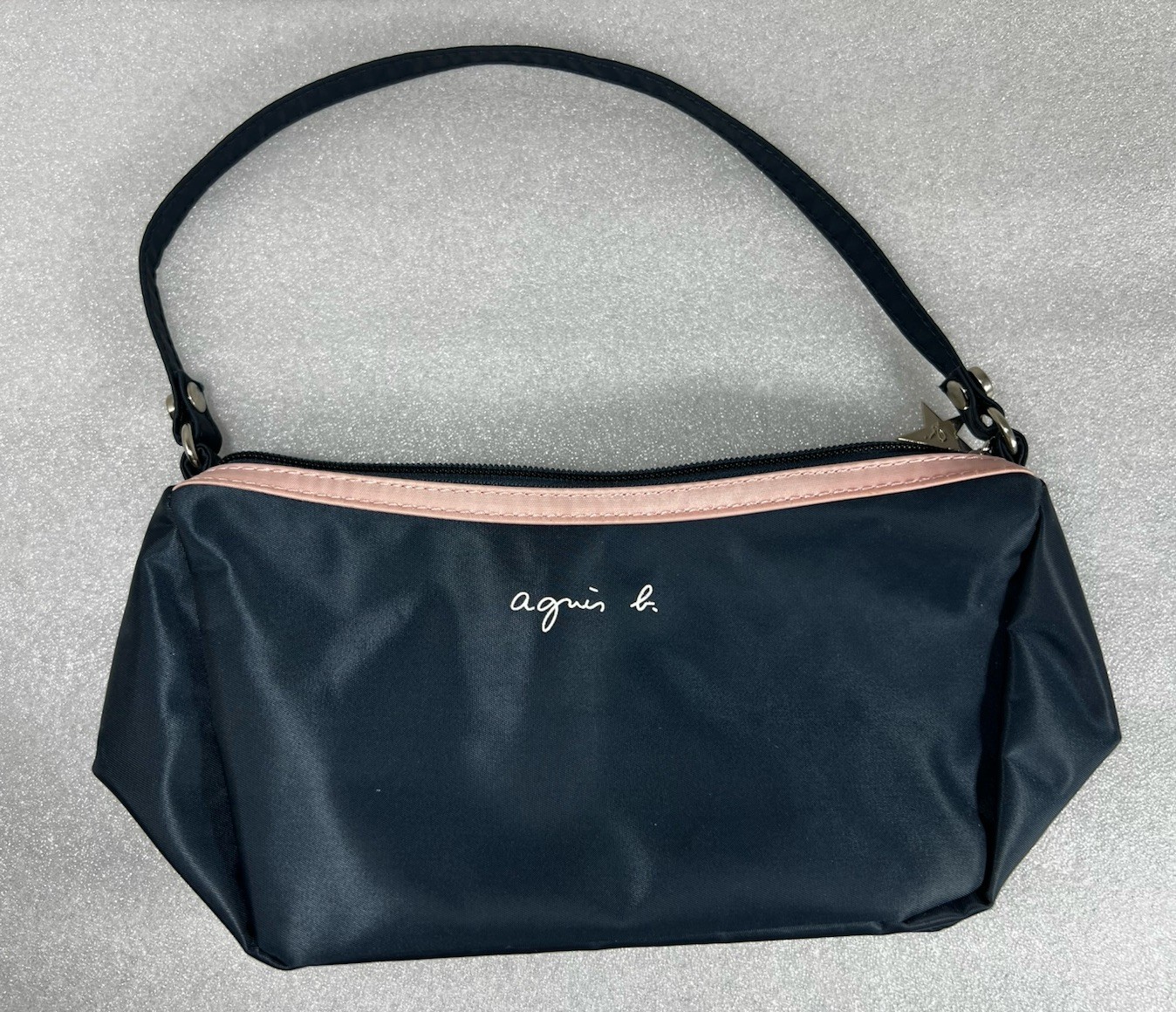 Agnès b. nylon zip top shoulder bag w/light pink w/single shoulder strap.