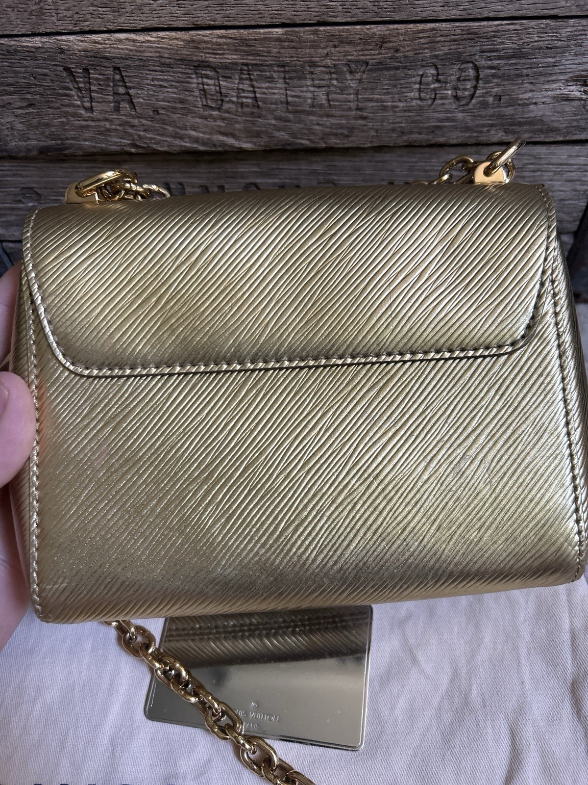 LOUIS VUITTON “Twist” gold epi leather handbag crossbody shoulder bag