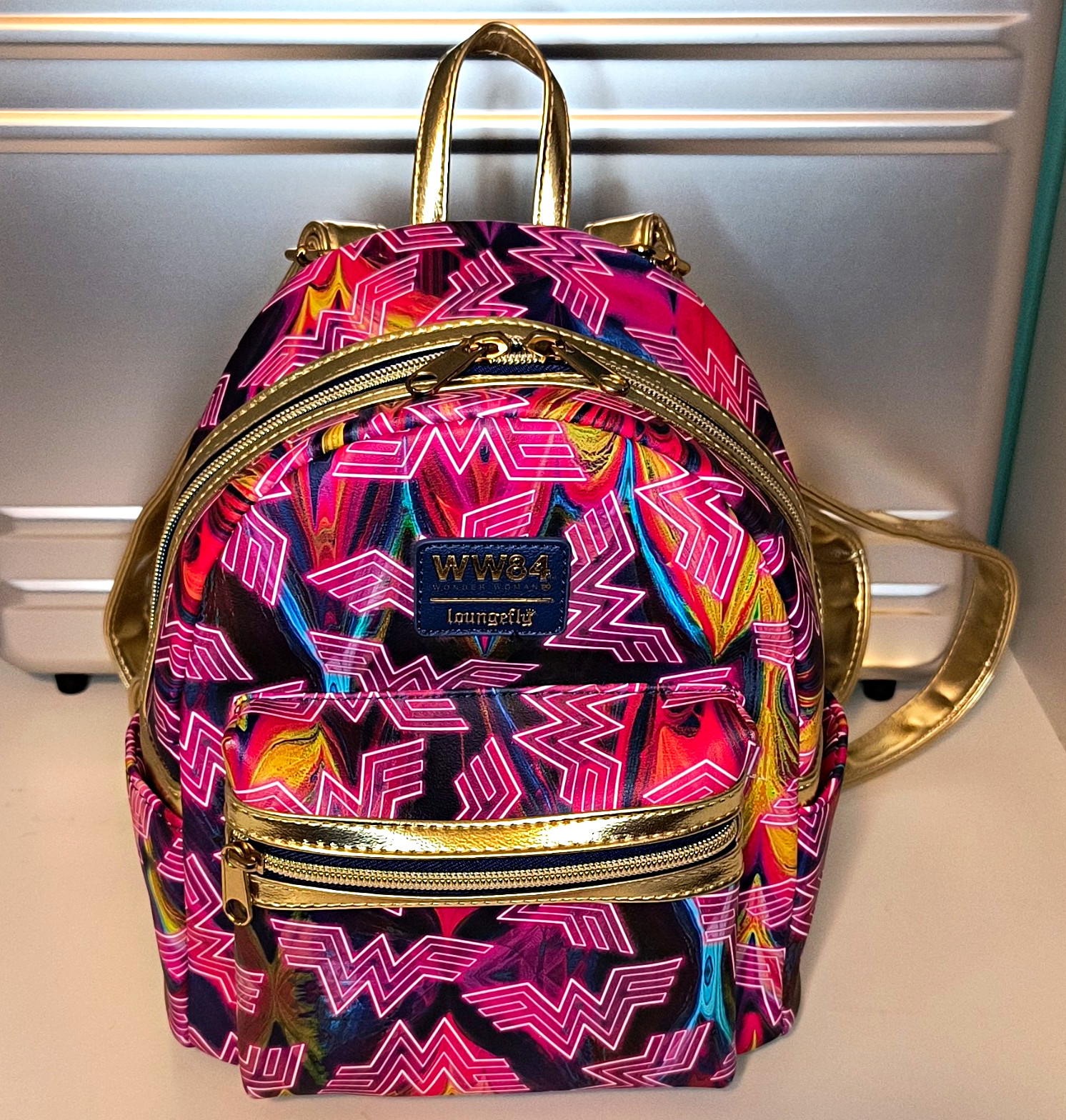 Loungefly Wonder Woman WW84 Mini Backpack Multicolor Logo Pattern Gold Straps
