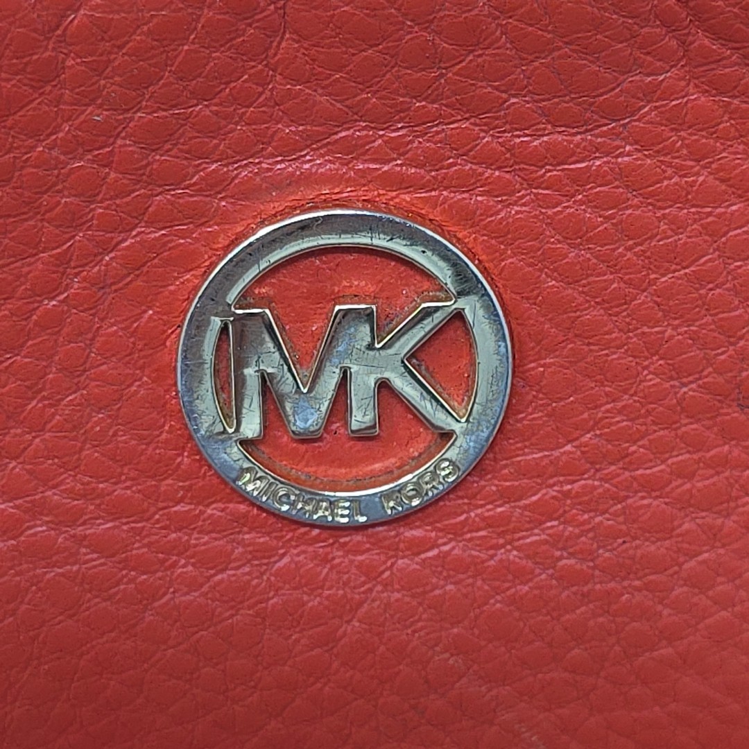 Michael Kors Pebble crossbody Tangerine Orange Purse Used