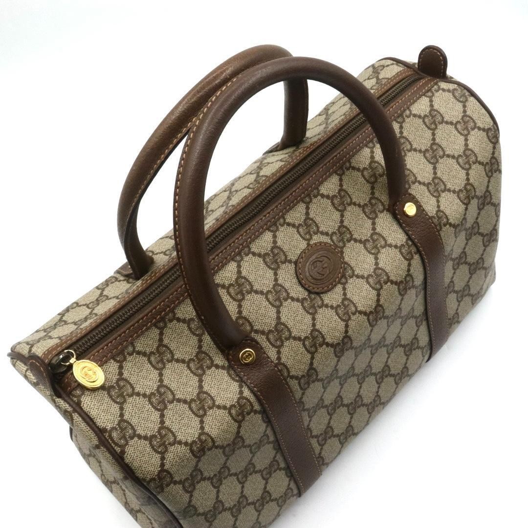 Gucci PVC canvas leather handbag, brown.