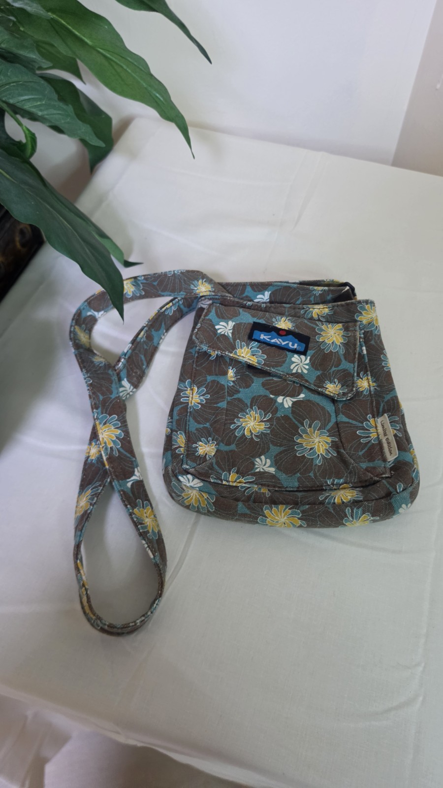 Kava Keeper Crossbody Bag In Foral Pattern on Dark Background