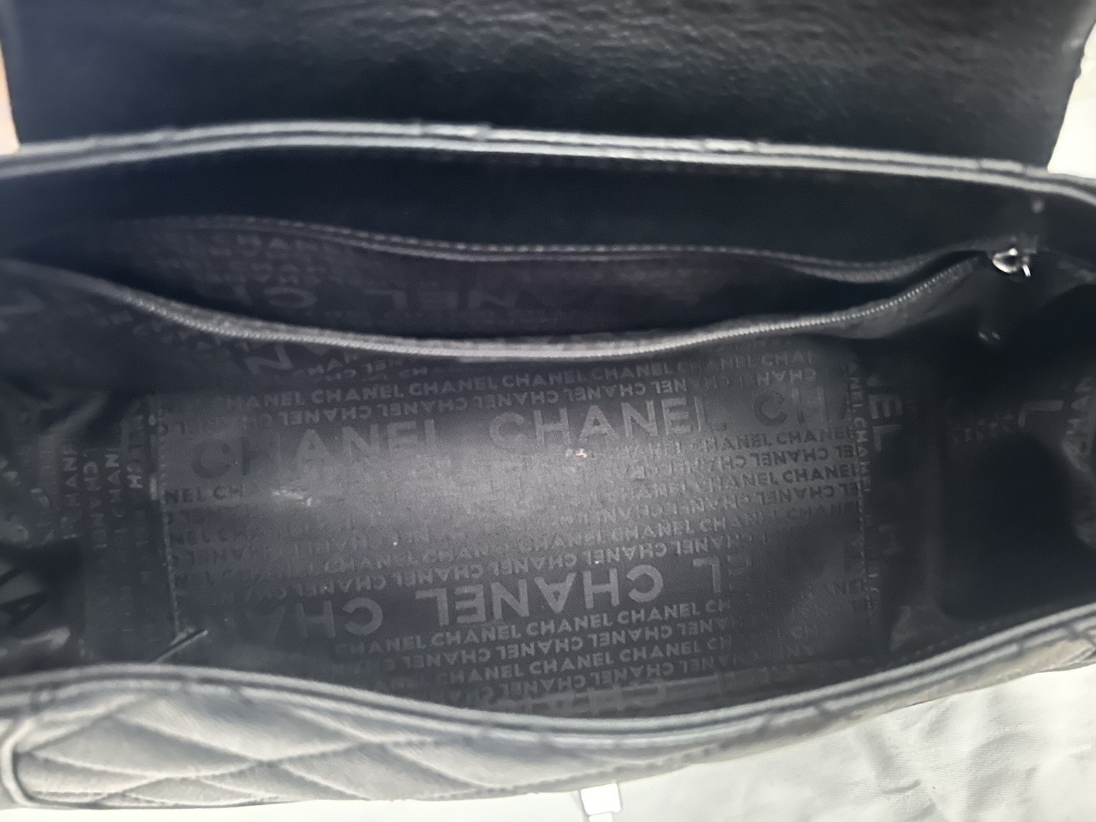 CHANEL Black Quilted Shoulder Bag with Turn Lock & Silver Hardware