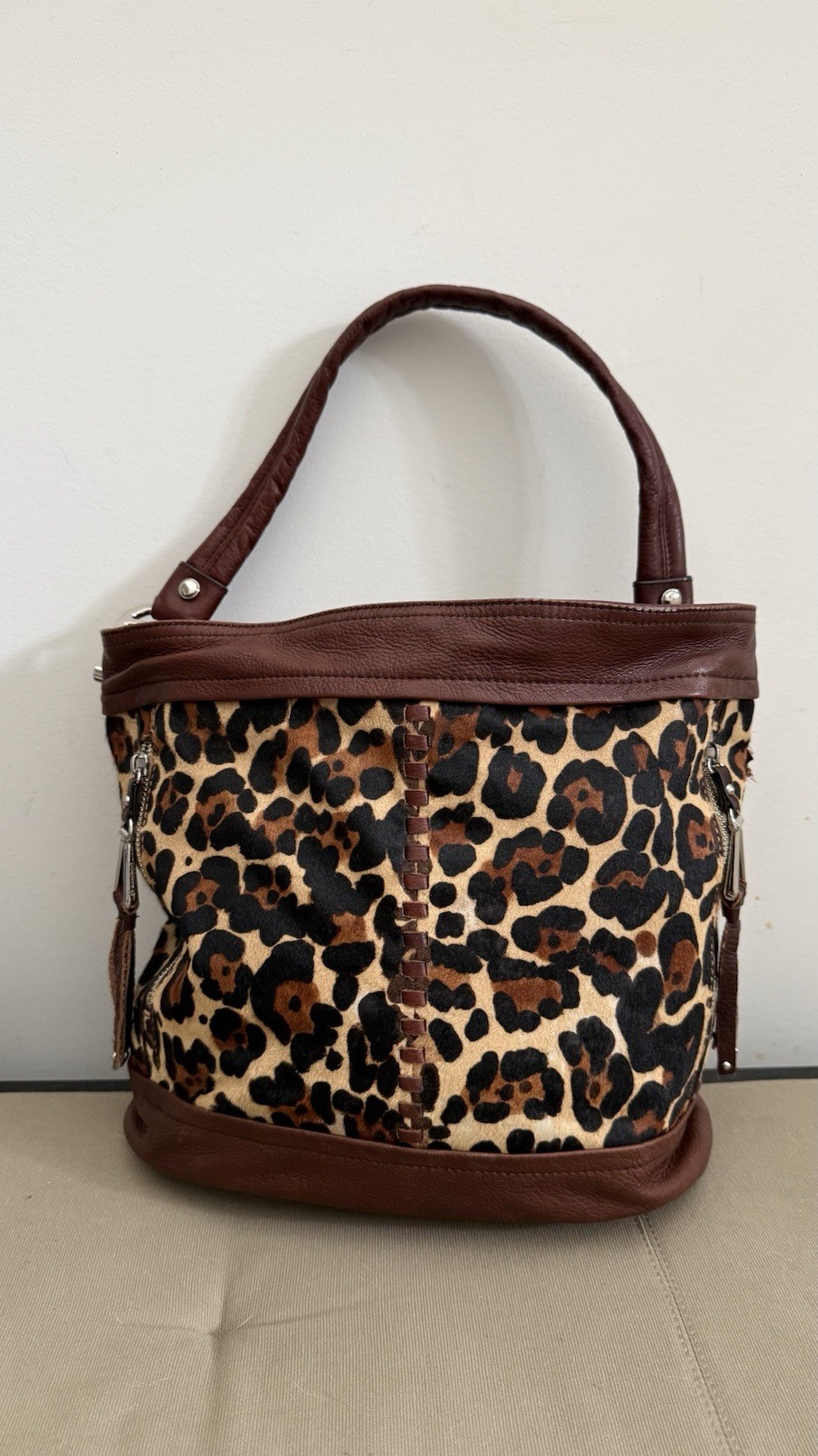 B. Makowsky Calf Hair Leather Leopard Print Handbag With Tassels