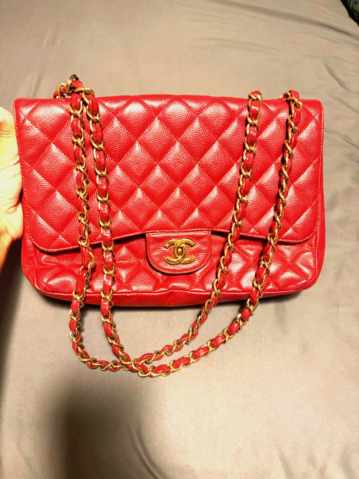 Chanel Classic Double Flap in caviar leather with gold hardware.