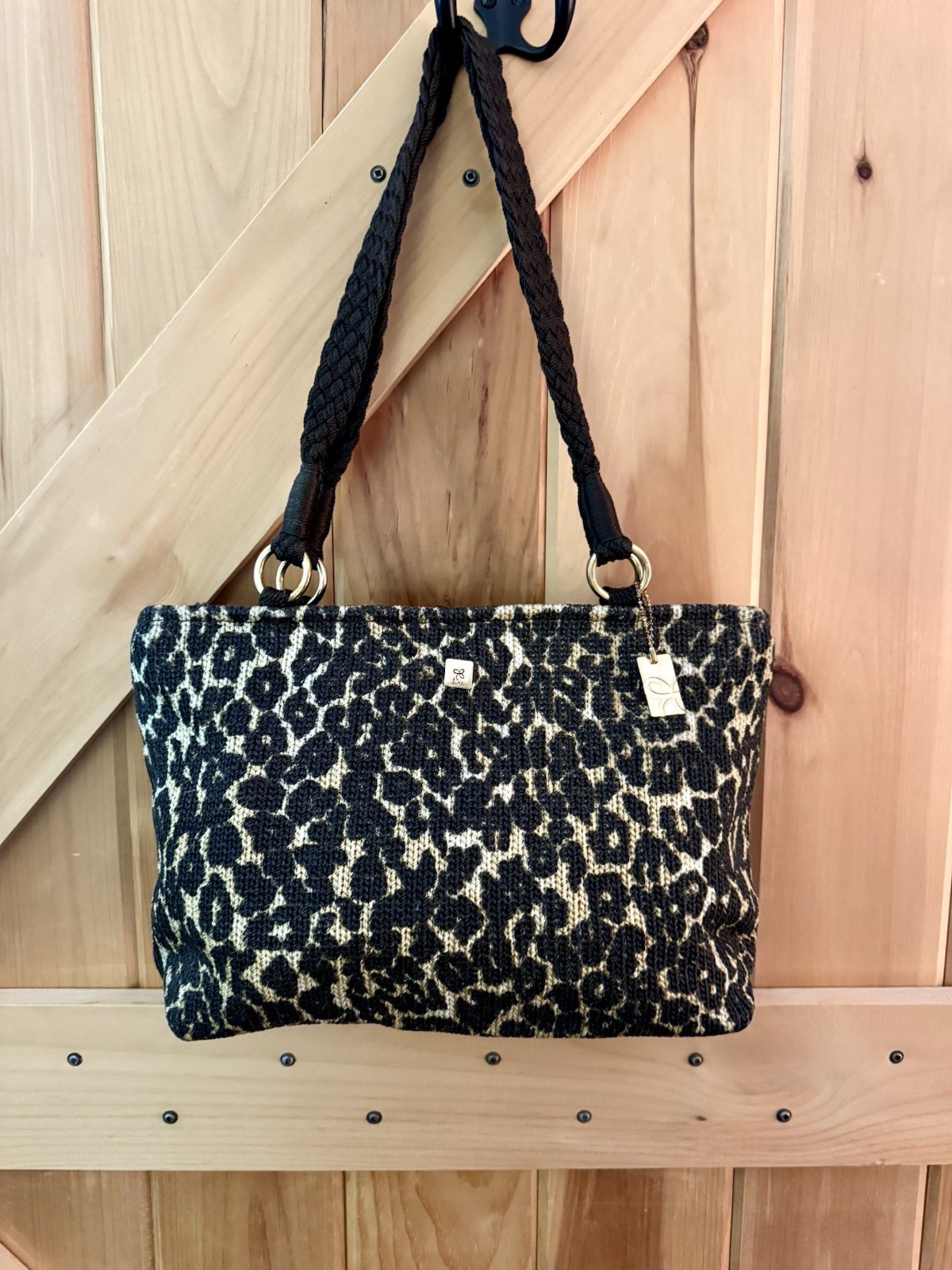 Lina Brand Woven Leopard Print Bag With Black Braided Shoulder Straps.