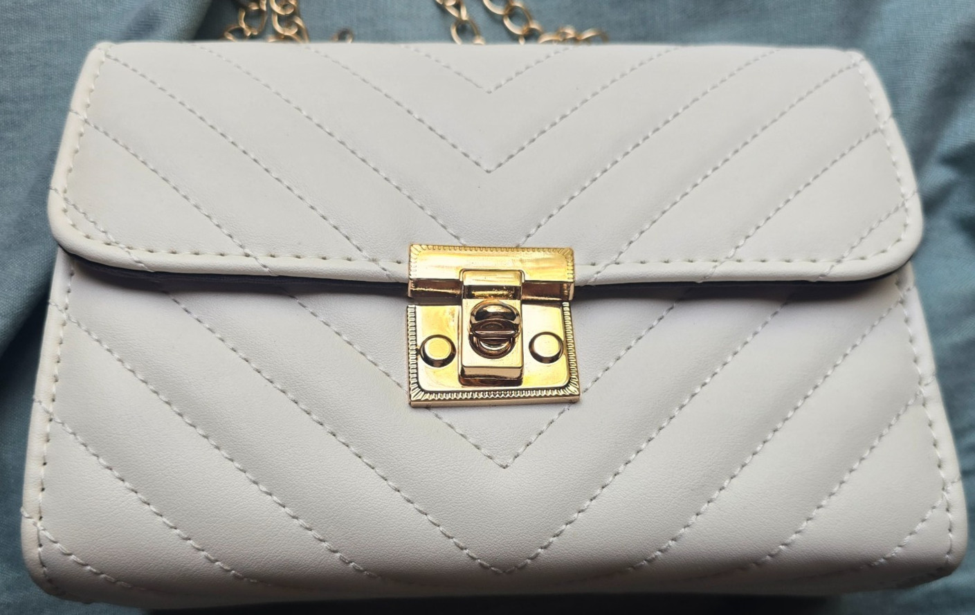 Ivory Quilted Crossbody Purse with Gold-Tone Chain Strap & Turn-Lock Closure