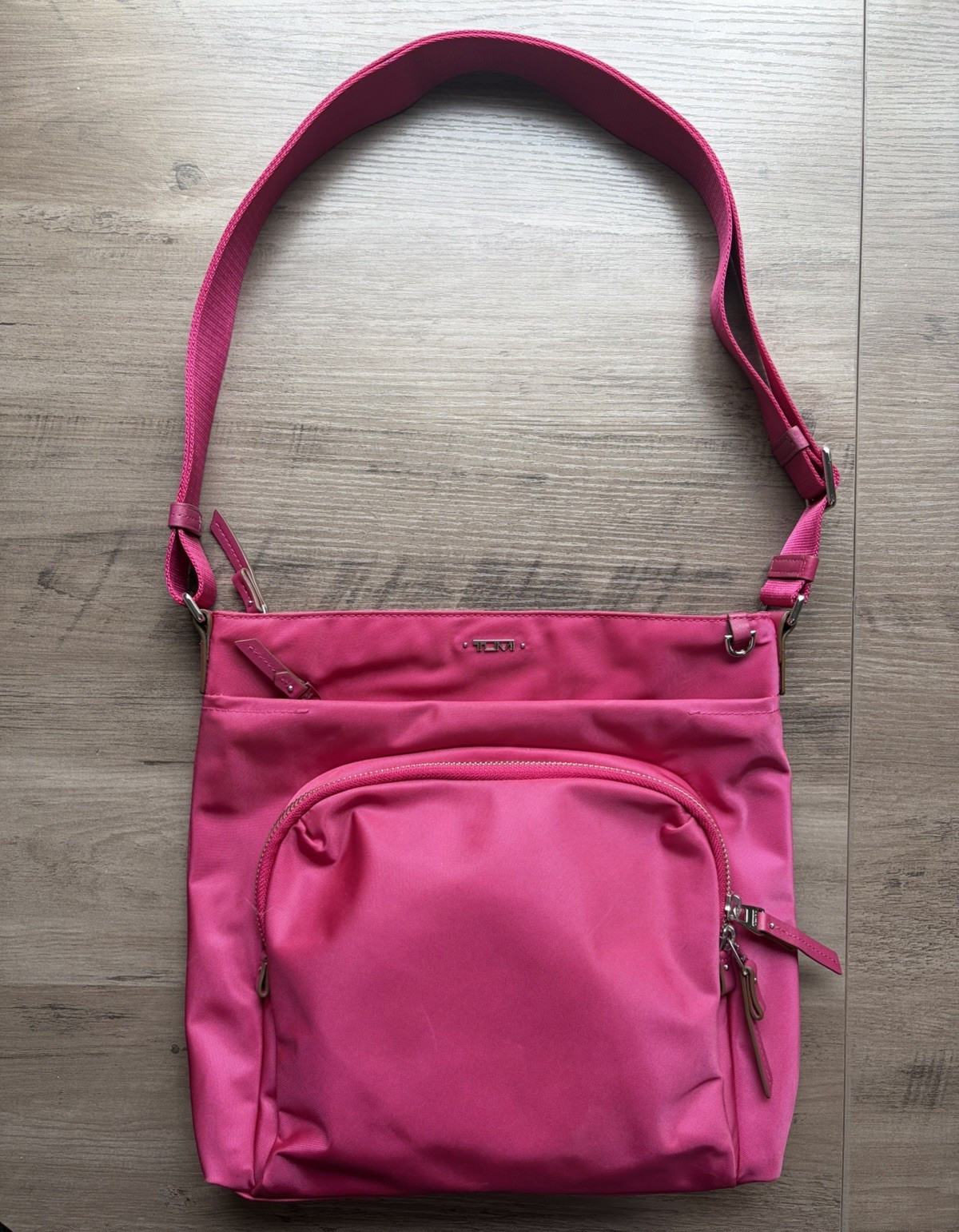 Tumi Pink Crossbody Bag Adjustable Strap Zip Closure Multiple Pockets Lined