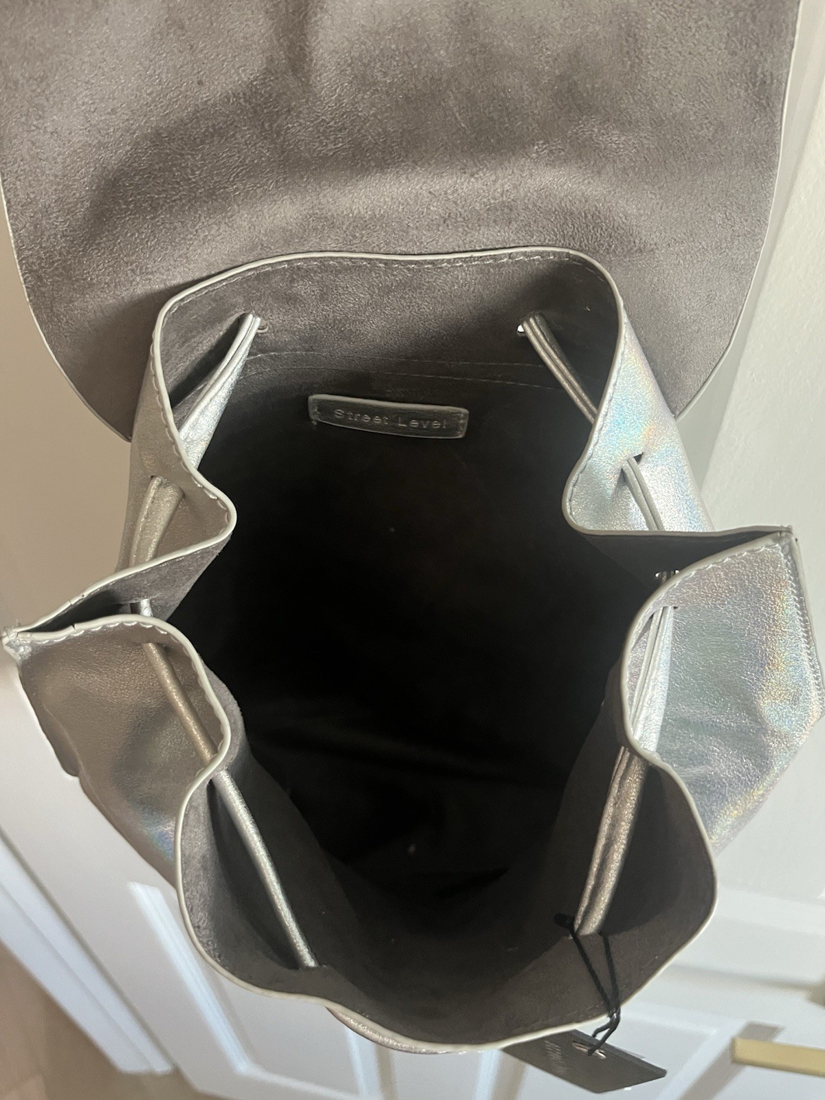 Street Level Metallic Silver Small Drawstring Backpack Magnetic Adj Strap