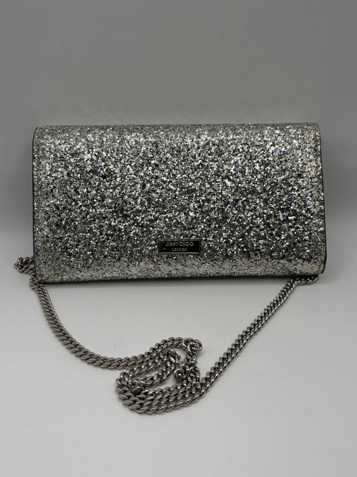 Jimmy Choo Silver Glitter Clutch w/ Chain Strap, Certificate of Authenticity.