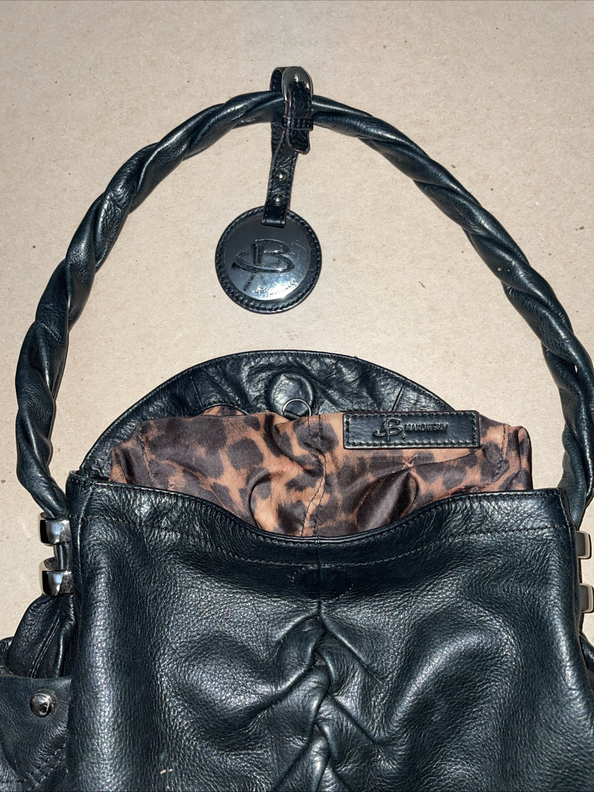 B. Makowsky Glove Leather Hobo Bag in black