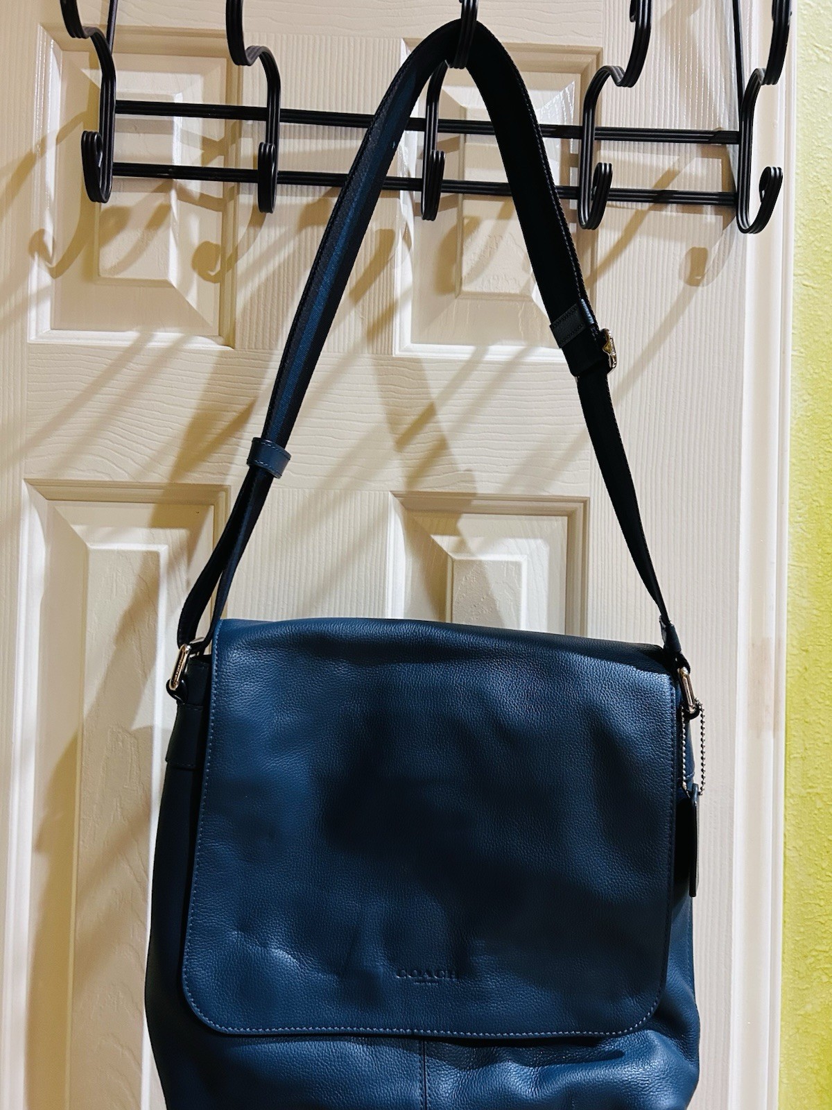 Coach Charles Messenger Bag in a deep blue leather.