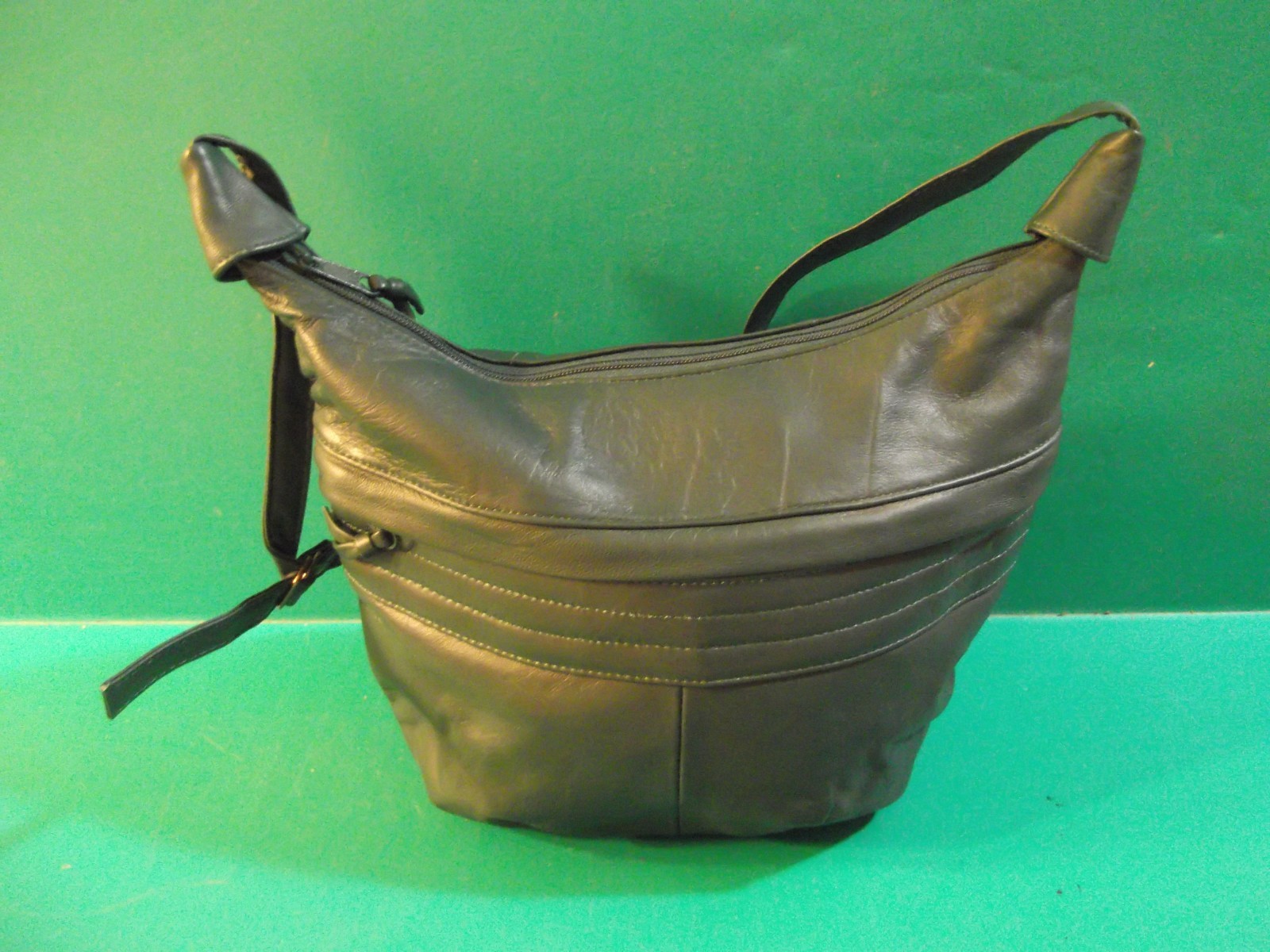 Drk Green Handbag/Purse 10″wide 8″in deep Strap 15″in Two Pockets one in/1 out