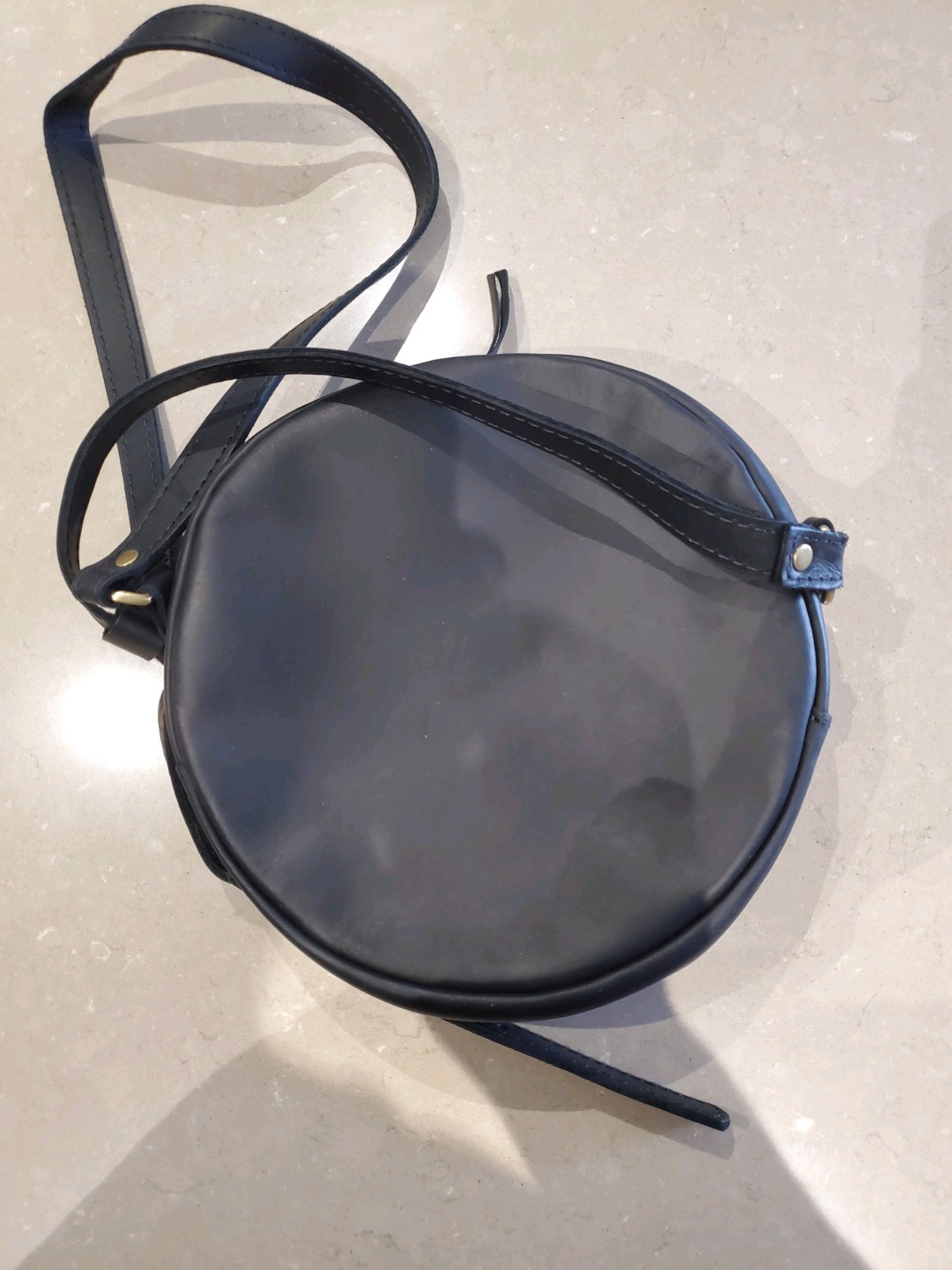 Portland Leather 9 inch Diameter Round Black Crossbody Bag Zip Closure.