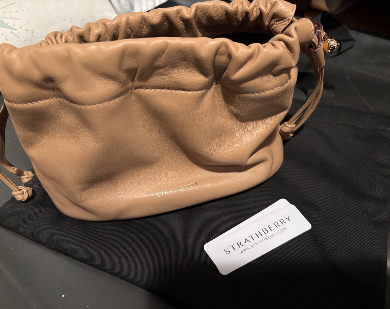 Strathberry Charlotte Drawstring – Caramel + tan colored cardholder