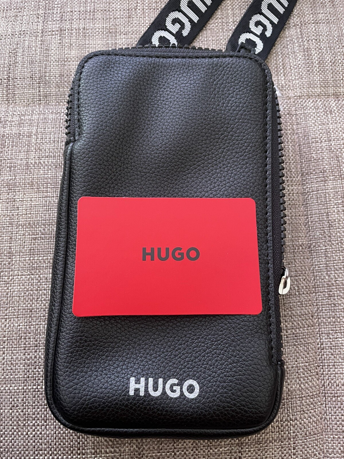 HUGO BOSS CROSSBODY ZIPPED PHONE POUCH. NEW