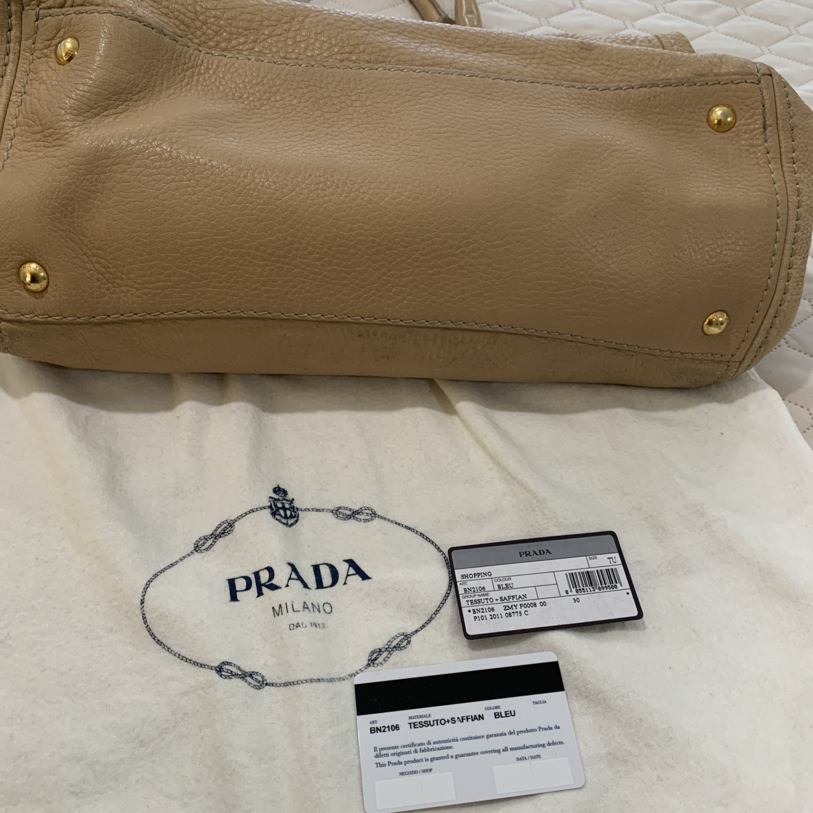 Prada Tessuto Two Way Leather Handbag with gold Hardware.