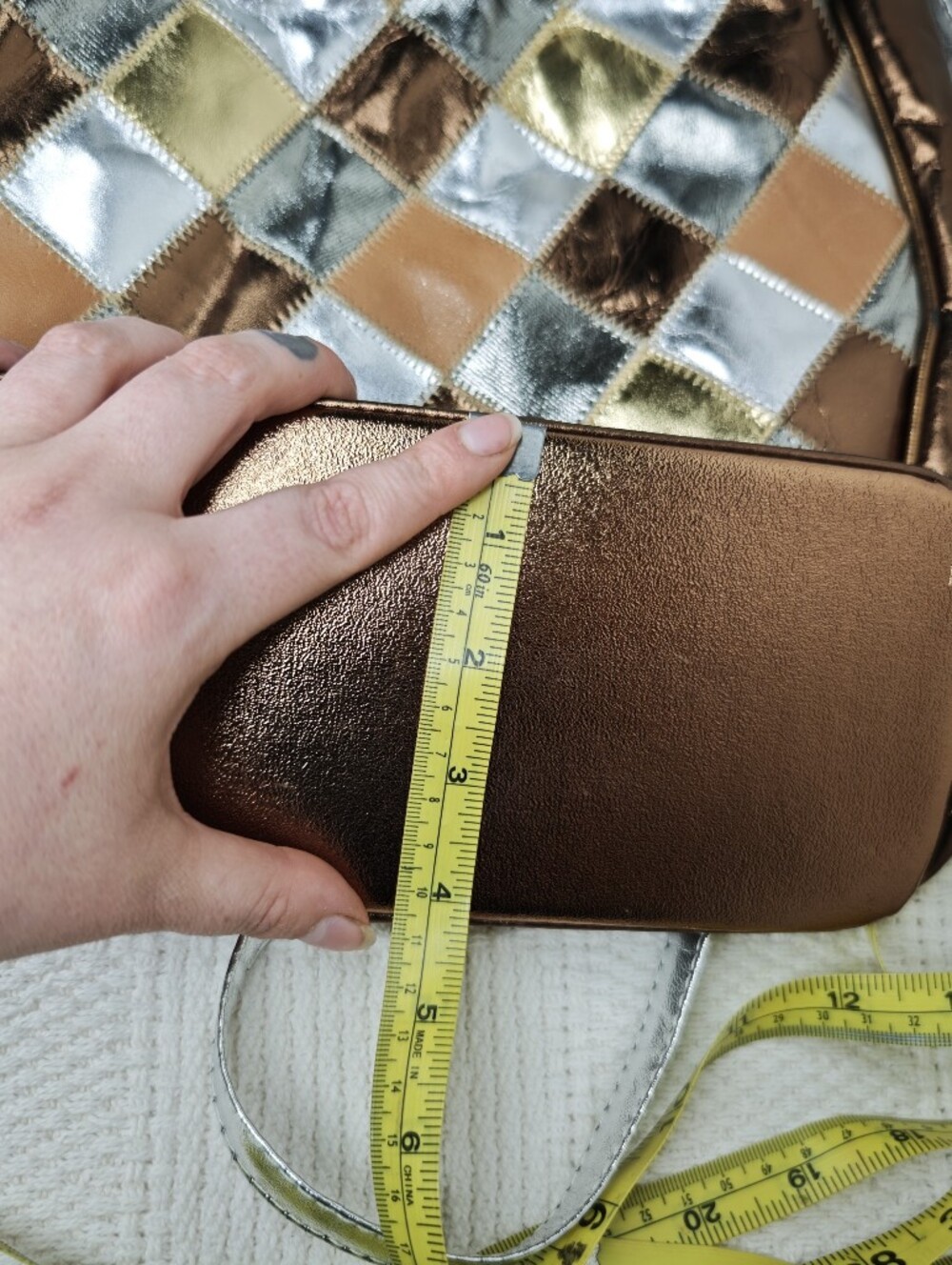Fifth Avenue Handbags multi metallic leather bucket bag