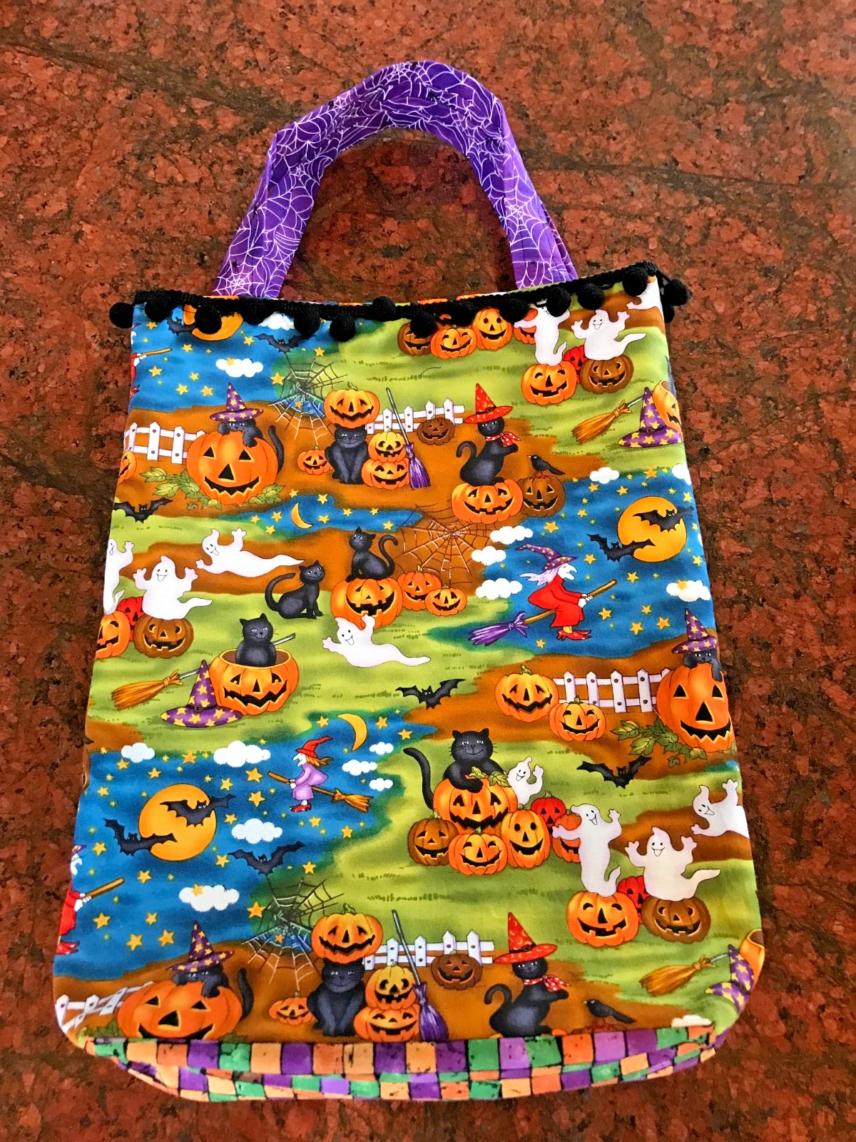 Halloween tote bag with embroidered cat design