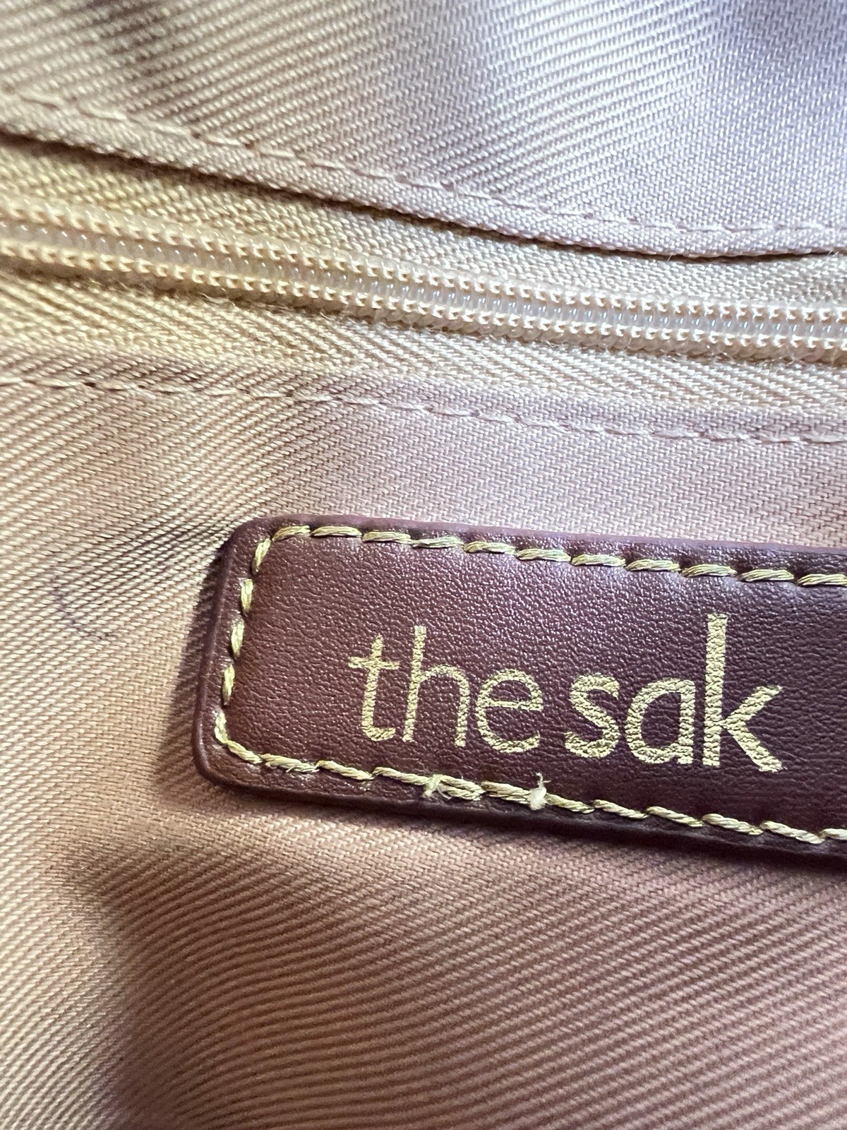 The Sak Tan Woven Crochet Shoulder Bag Purse Zip Top Lined Pockets Charm Boho