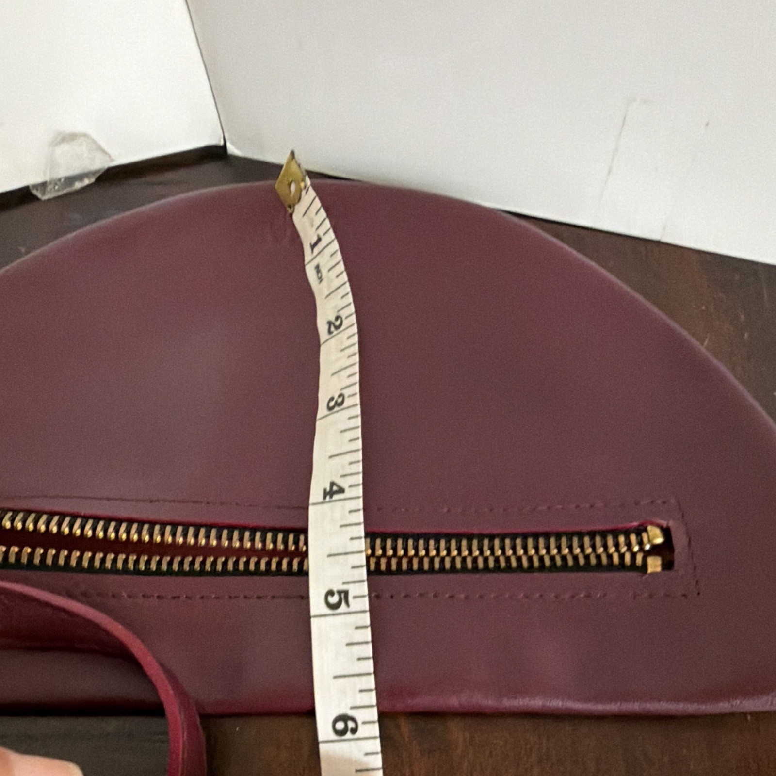 LAMARI Berlin Burgundy Crescent Crossbody Bag Gold Hardware Zip Closure