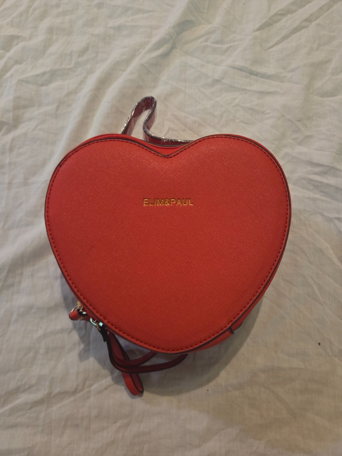 elim and paul red heart shaped crossbody bag
