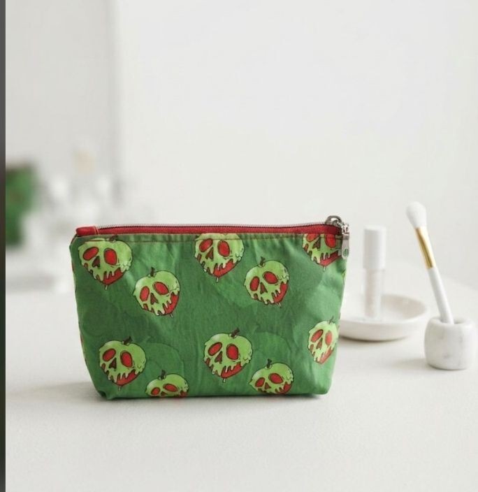poison red apple on green cotton fabric Cosmetic Pouch, w/ red canvas lining