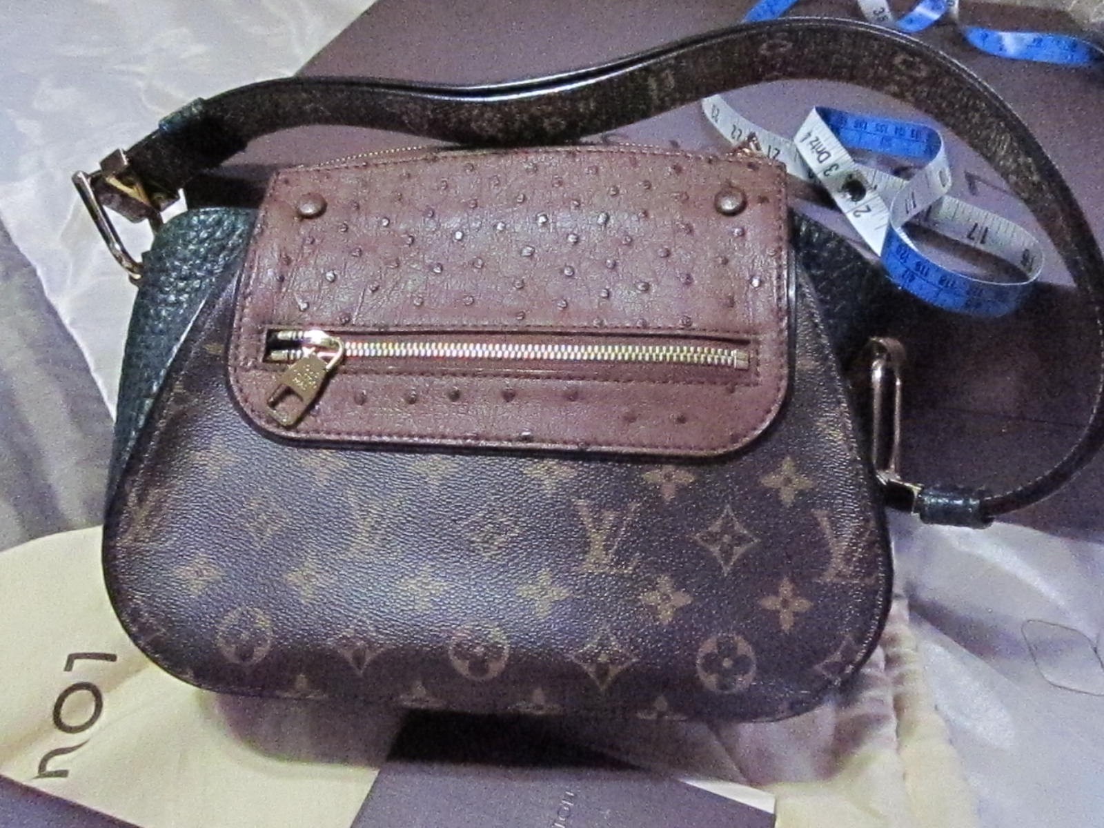 Louis Vuitton shoulder majesteau exotic purse never used