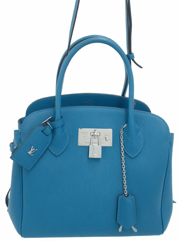 Louis Vuitton Milla bag black pebbled Veau Nuage leather