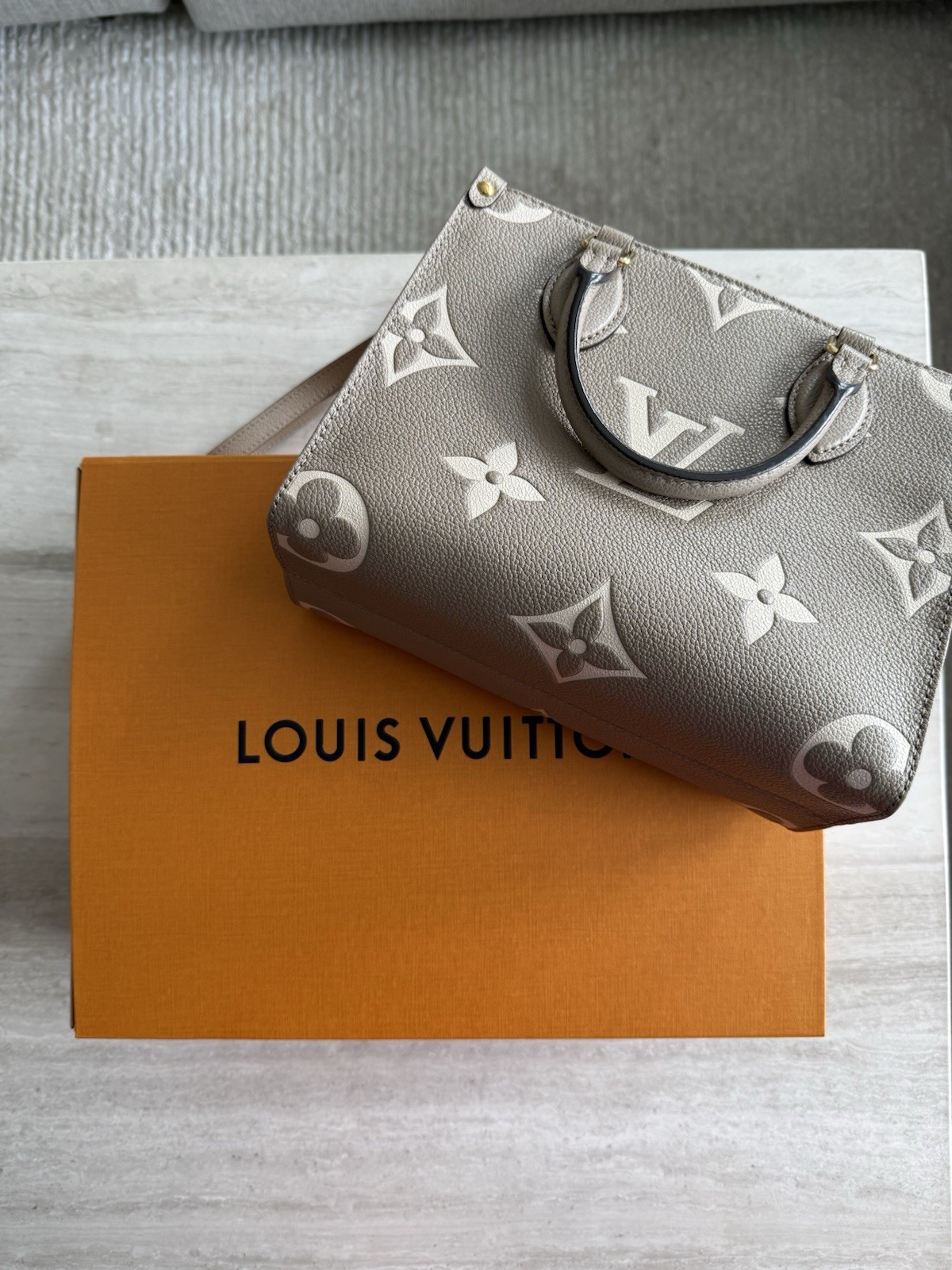 Louis Vuitton Small OnTheGo Satchel Monogram Empreinte Taupe Zip Strap Box