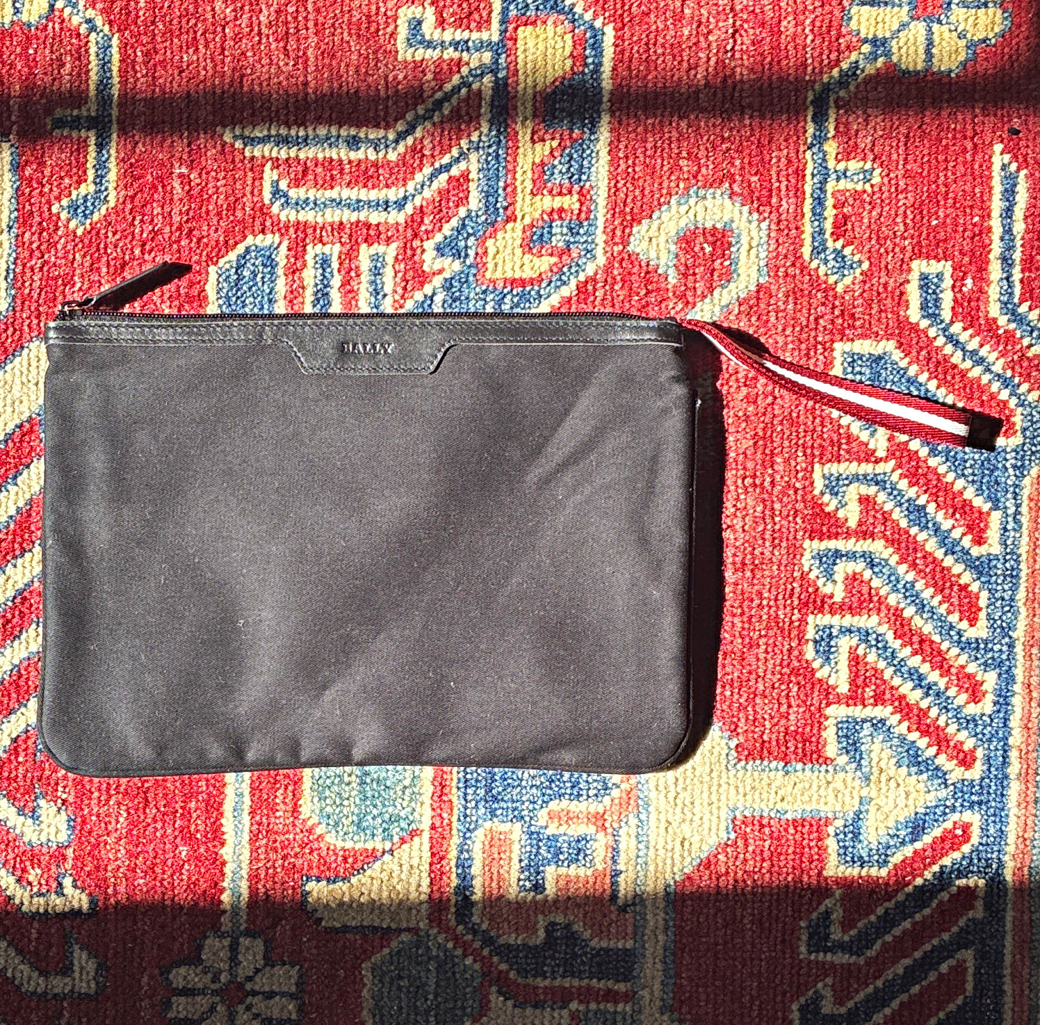 BALLY x Swiss, Black Solid Rectangle Zip Clutch Wristlet Pouch w/ Wrist Strap