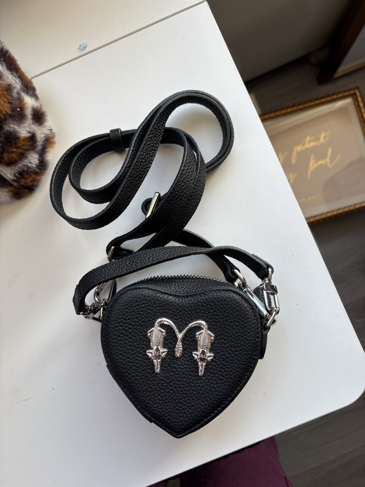 Black Heart-Shaped Mini Shoulder Bag with Silver Hardware and Zip Closure