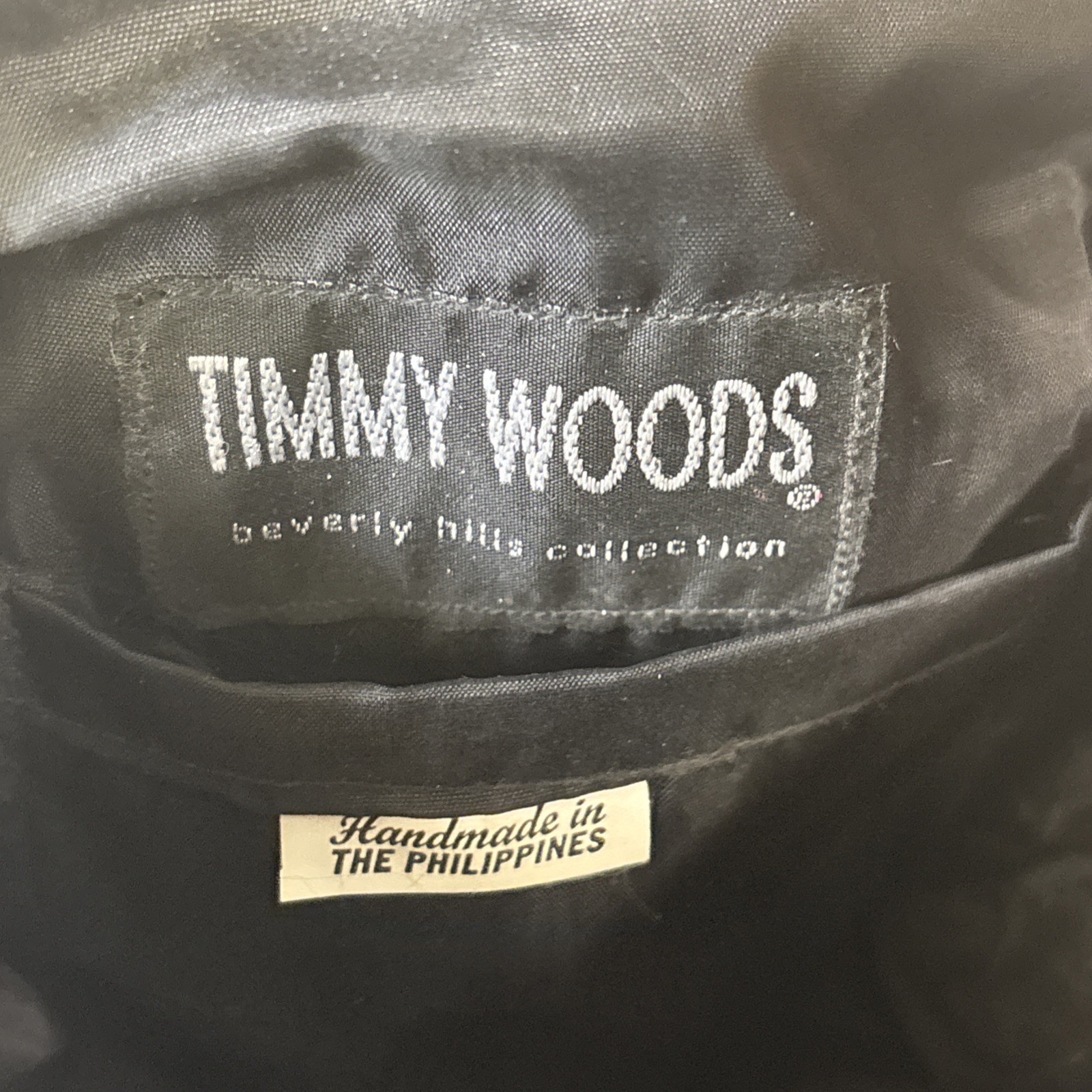 Timmy Woods Beverly Hills Hand-Carved Acacia Wood Lion Head Handbag.