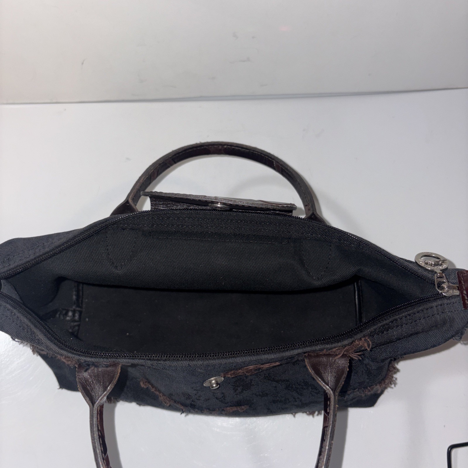 longchamp le pliage black bag 7x13in