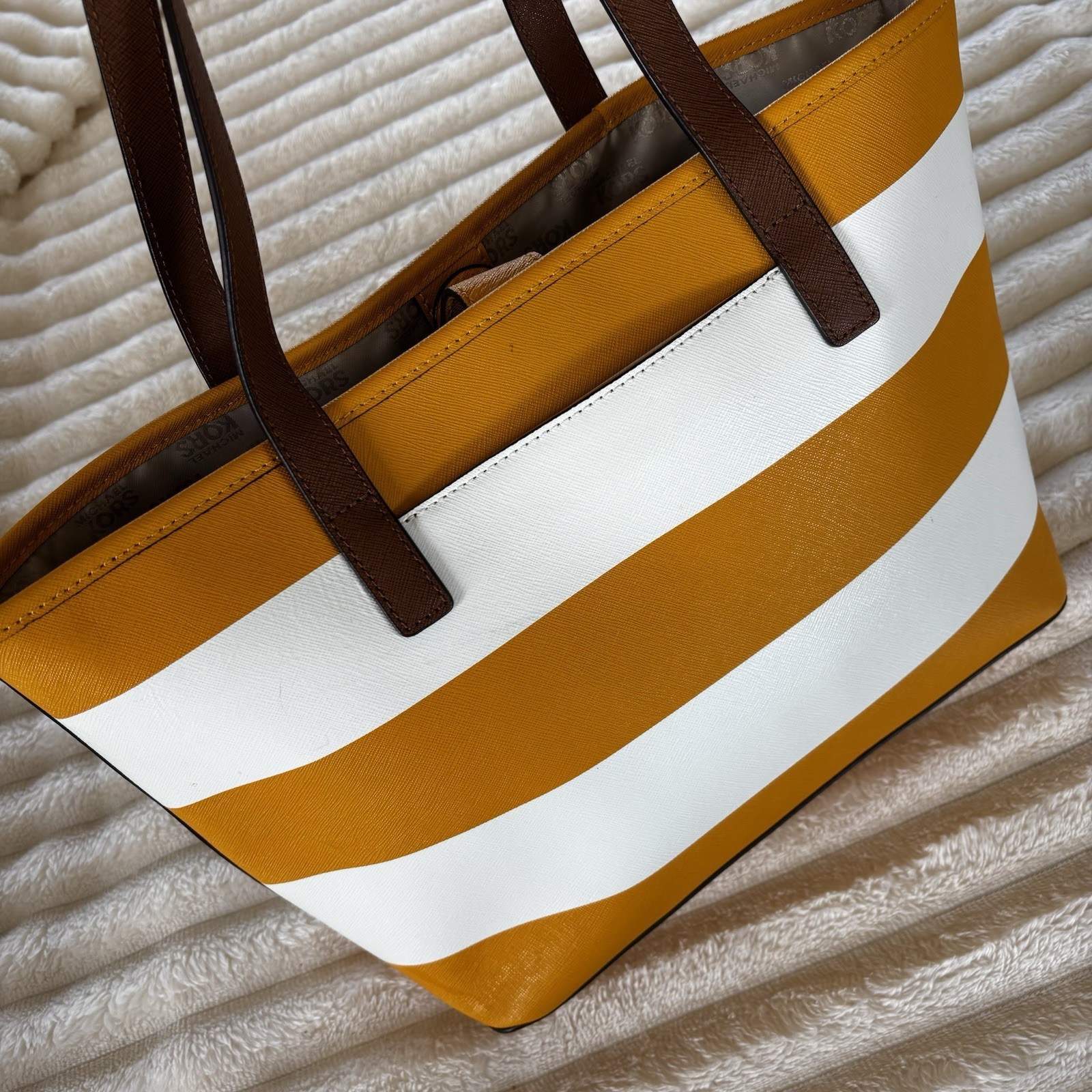 Michael Kors purse, Yellow And White Stripped, With Brown Straps.