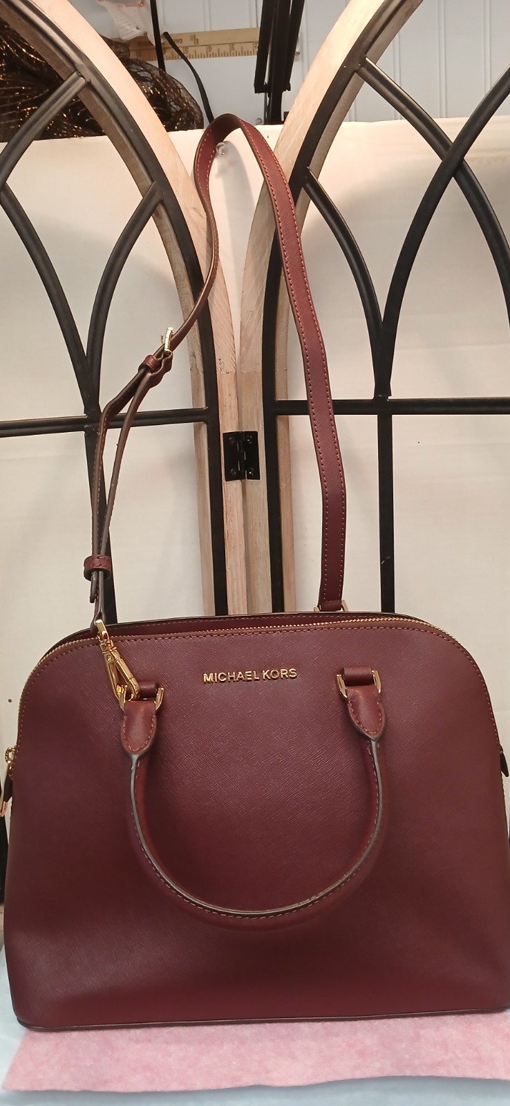 michael kors upscale handbag in Plum zipper closure side pocket strap and handle
