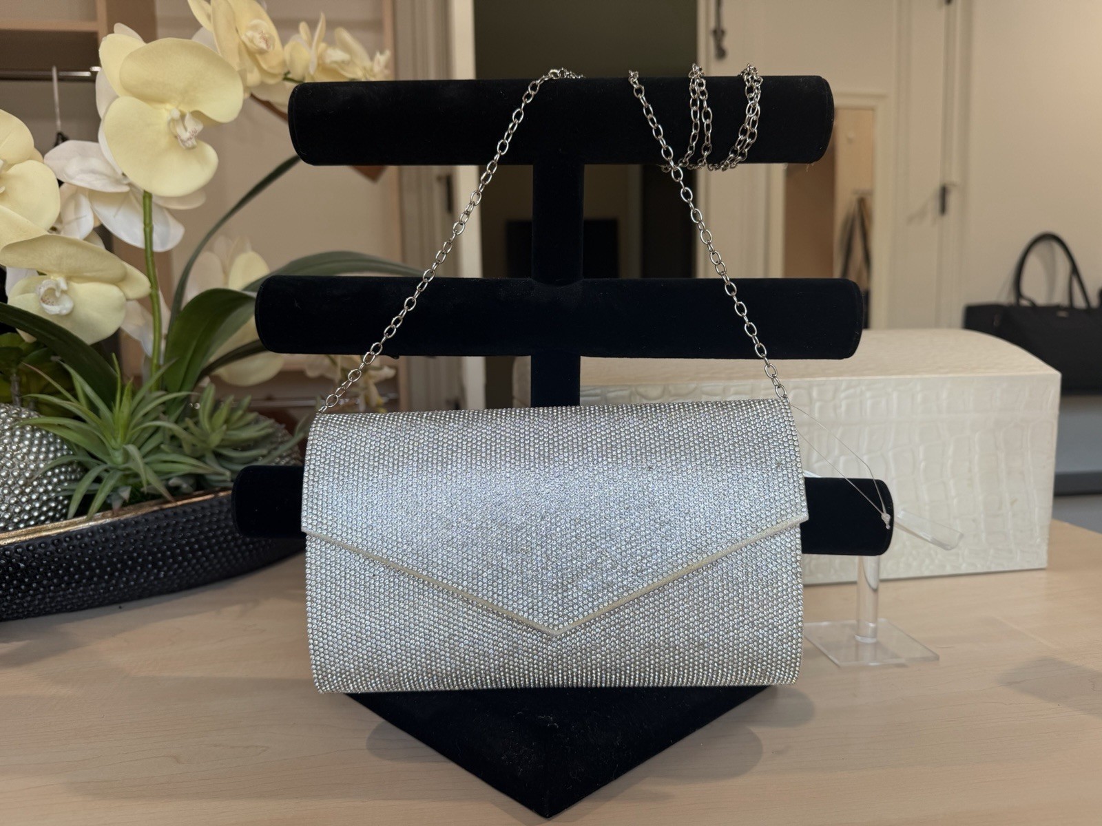 Silver rhinestone clutch with chain strap Bella collection by Qara