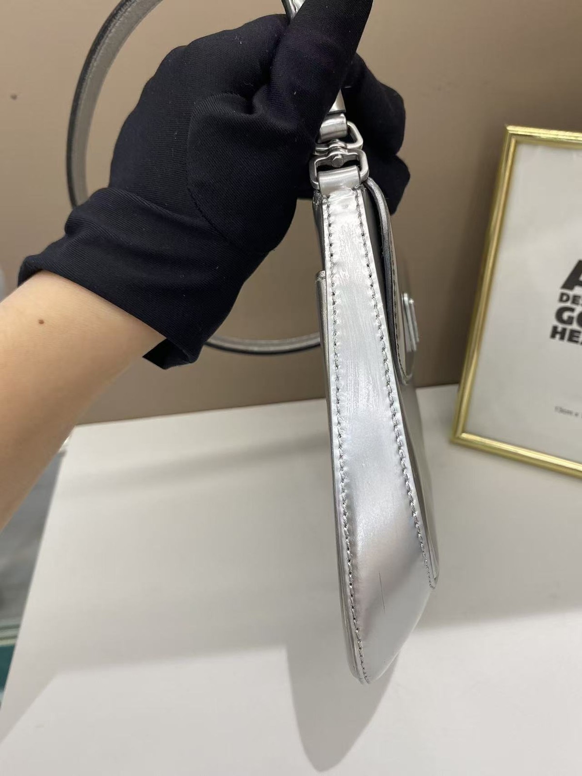 Authentic Prada Cleo shoulder bag in metallic silver leather