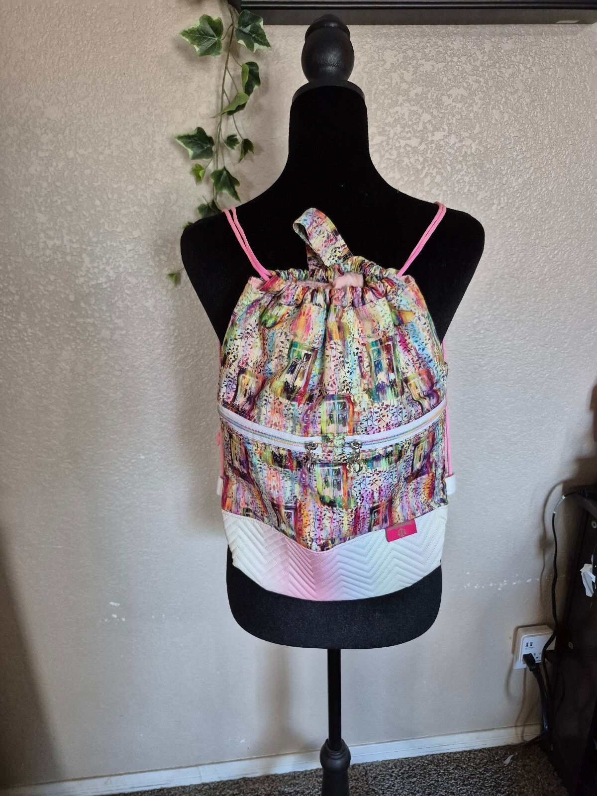 Colorful Drawstring Backpack with Quilted Bottom and Heart-Shaped Zipper Pulls