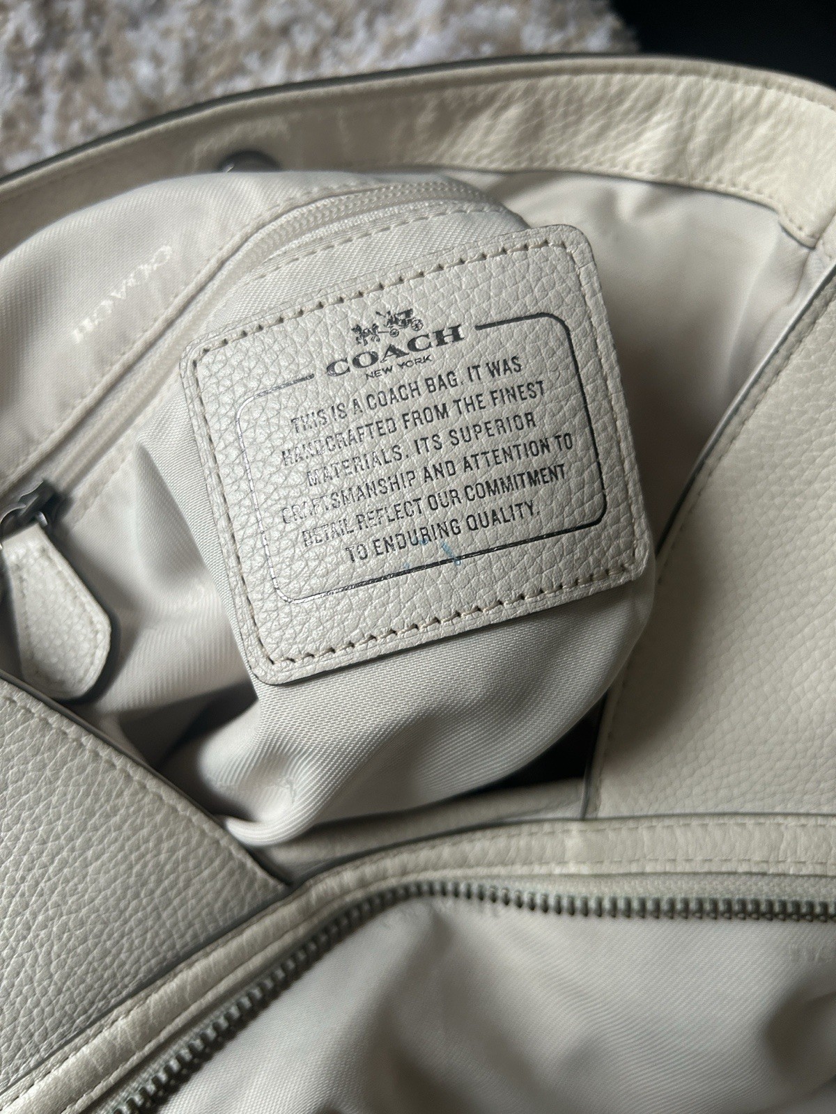 Coach Beige Pebbled Studded Shoulder Bag, Zip Closure, Inner Pockets, Charm